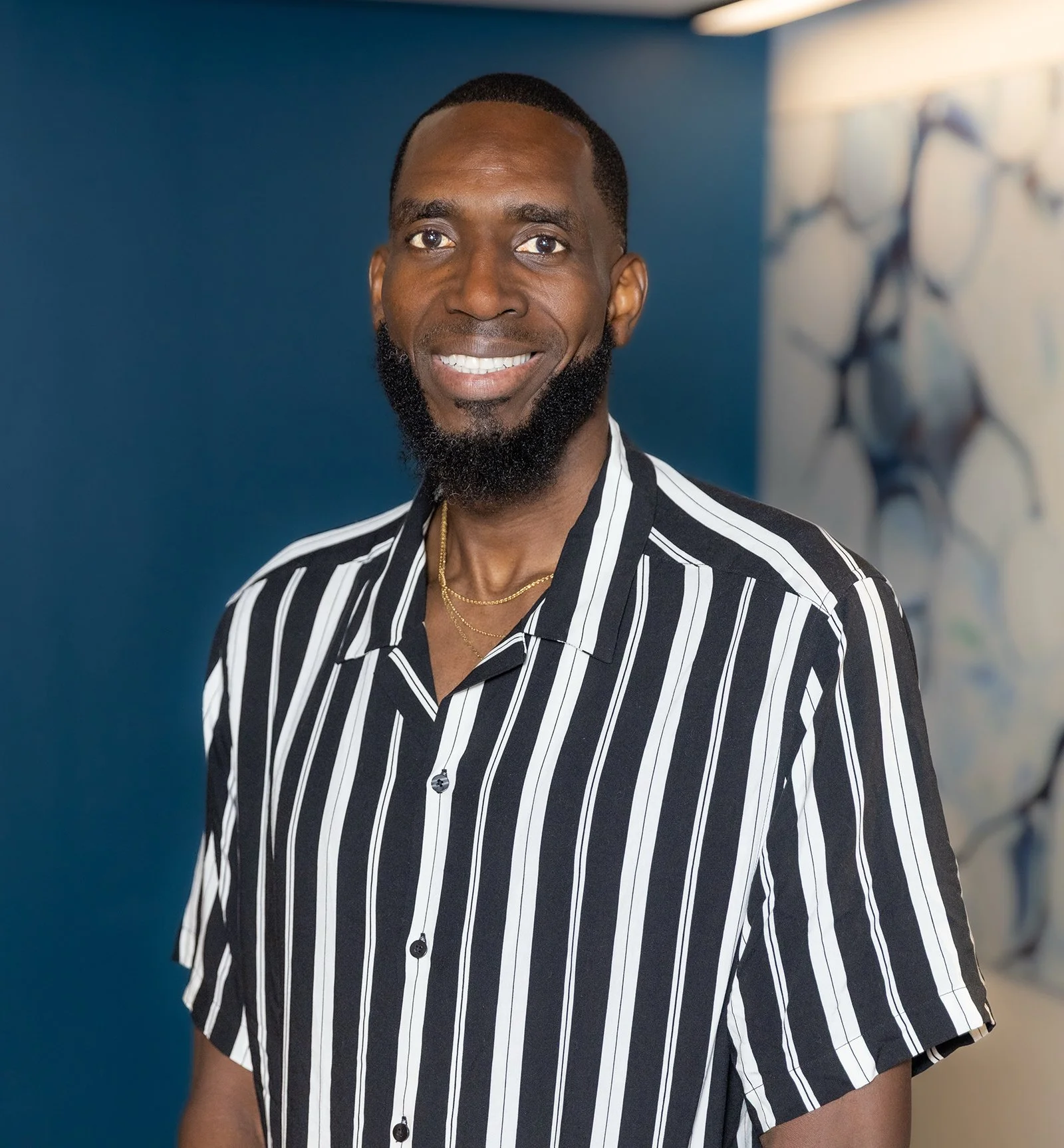 Blaise Mbargorba, President and founder of Tomorrow Education, leading an international charity and education nonprofit supporting children in Africa.