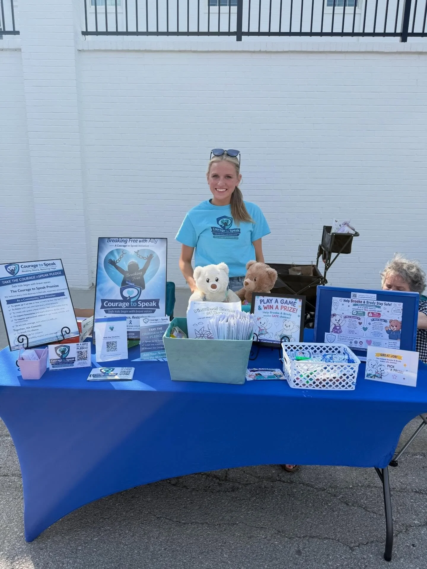 Breaking Free with Ally had an information booth at a child abuse prevention community awareness event on our local county, complete with a safety game for kids and &ldquo;Safety Hero&rdquo; badges. #stopchildabuse