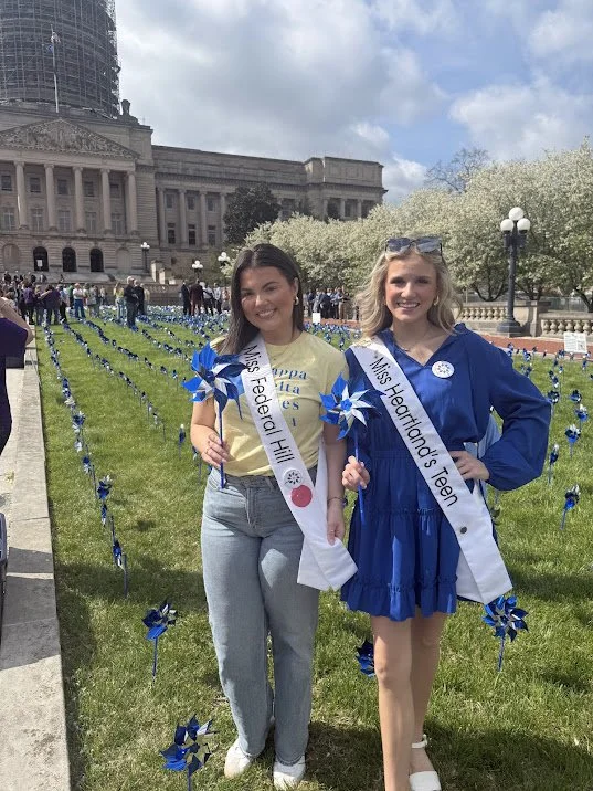 Me with my sister queen Hannah at the pinwheel planting ceremony