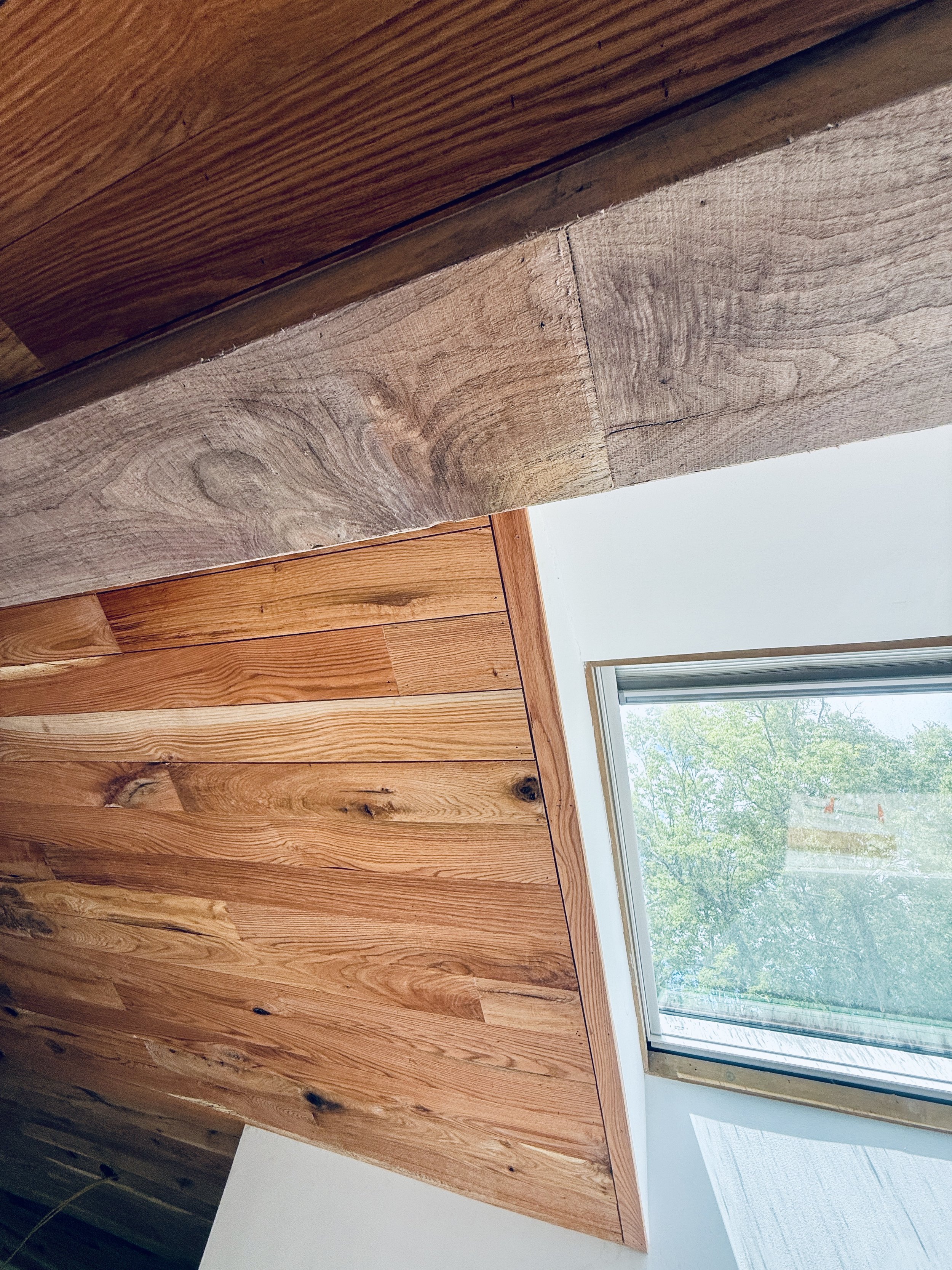 red oak and unstained walnut clad beams