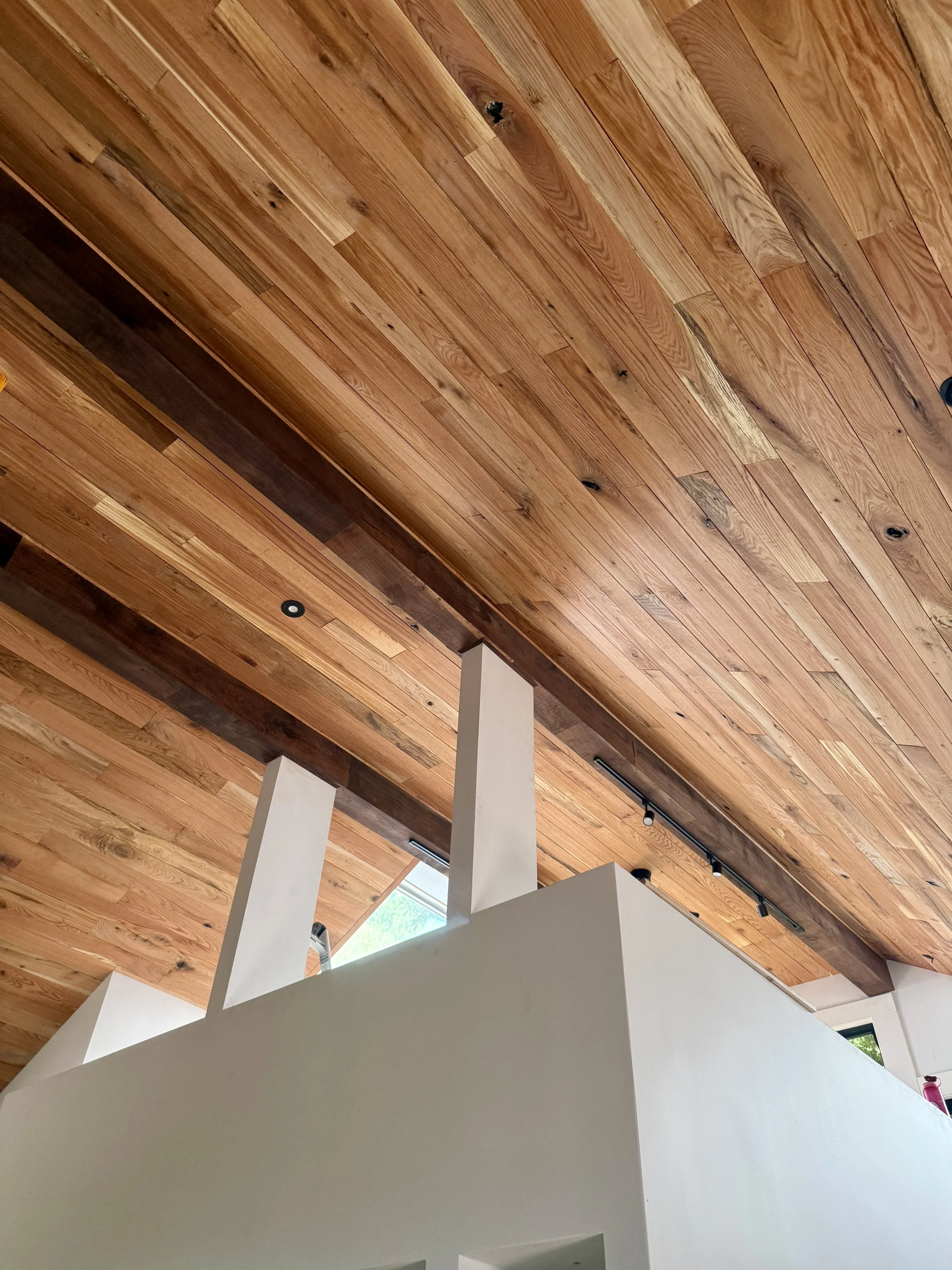 red oak and walnut clad beams