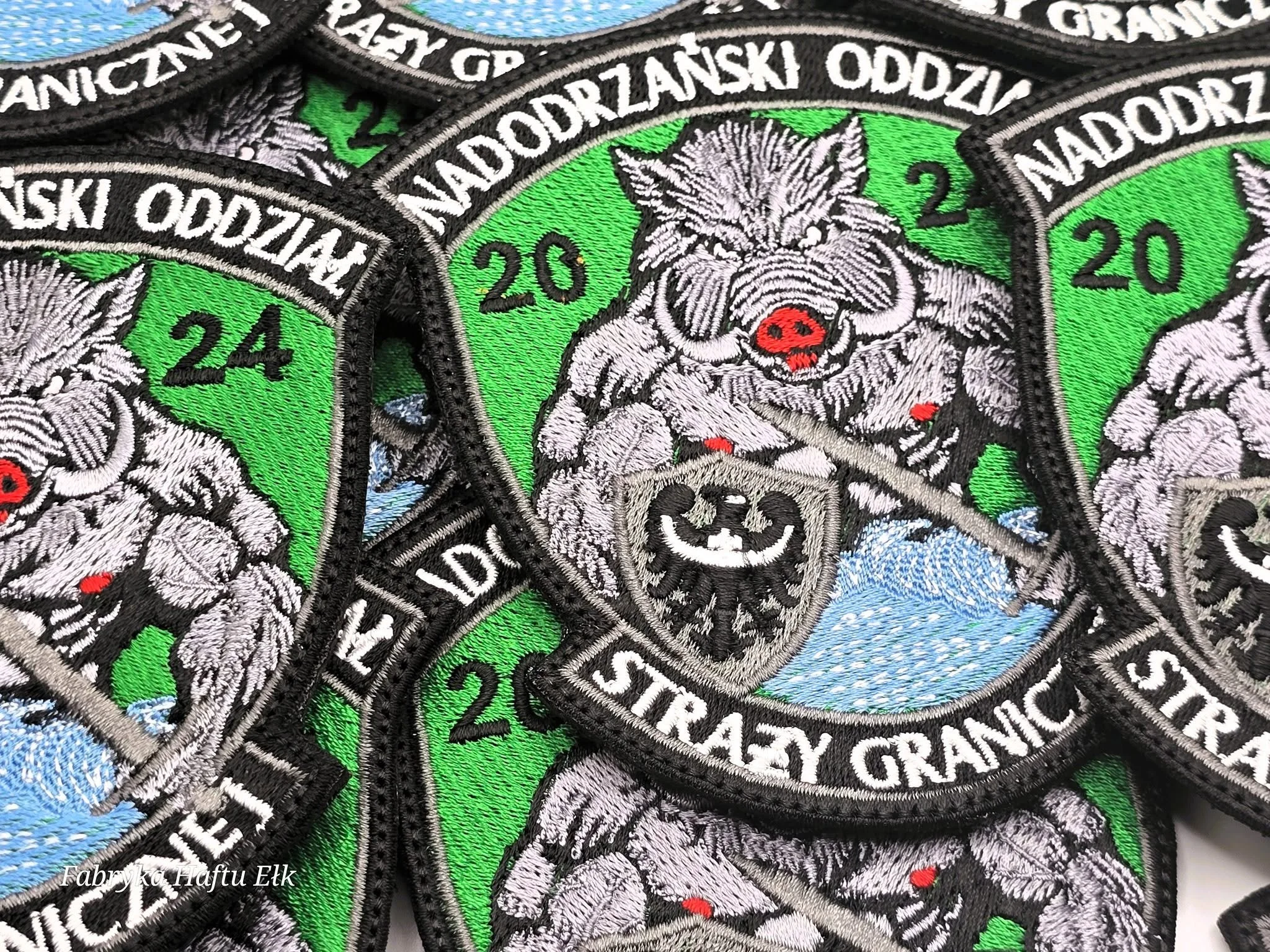 Haftowane naszywki Nadodrzańskiego Oddziału Straży Granicznej – Fabryka Haftu Ełk