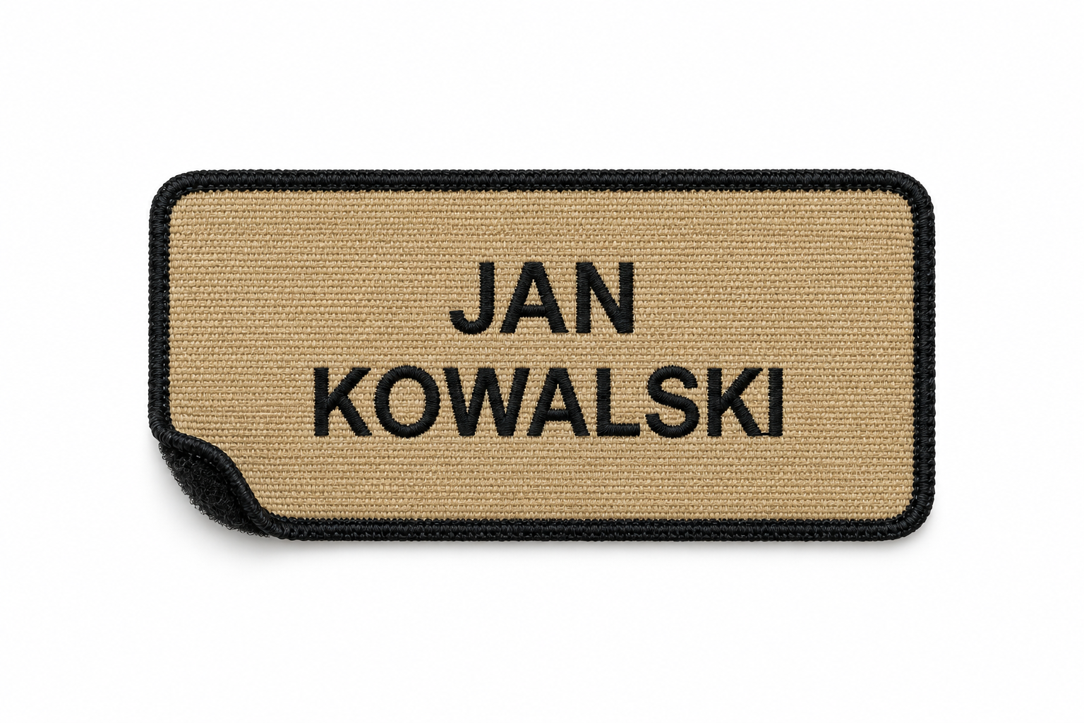 Imiennik PSP ze złotym imieniem i nazwiskiem w dwóch wierszach, na czarnym tle z czarną ramką.