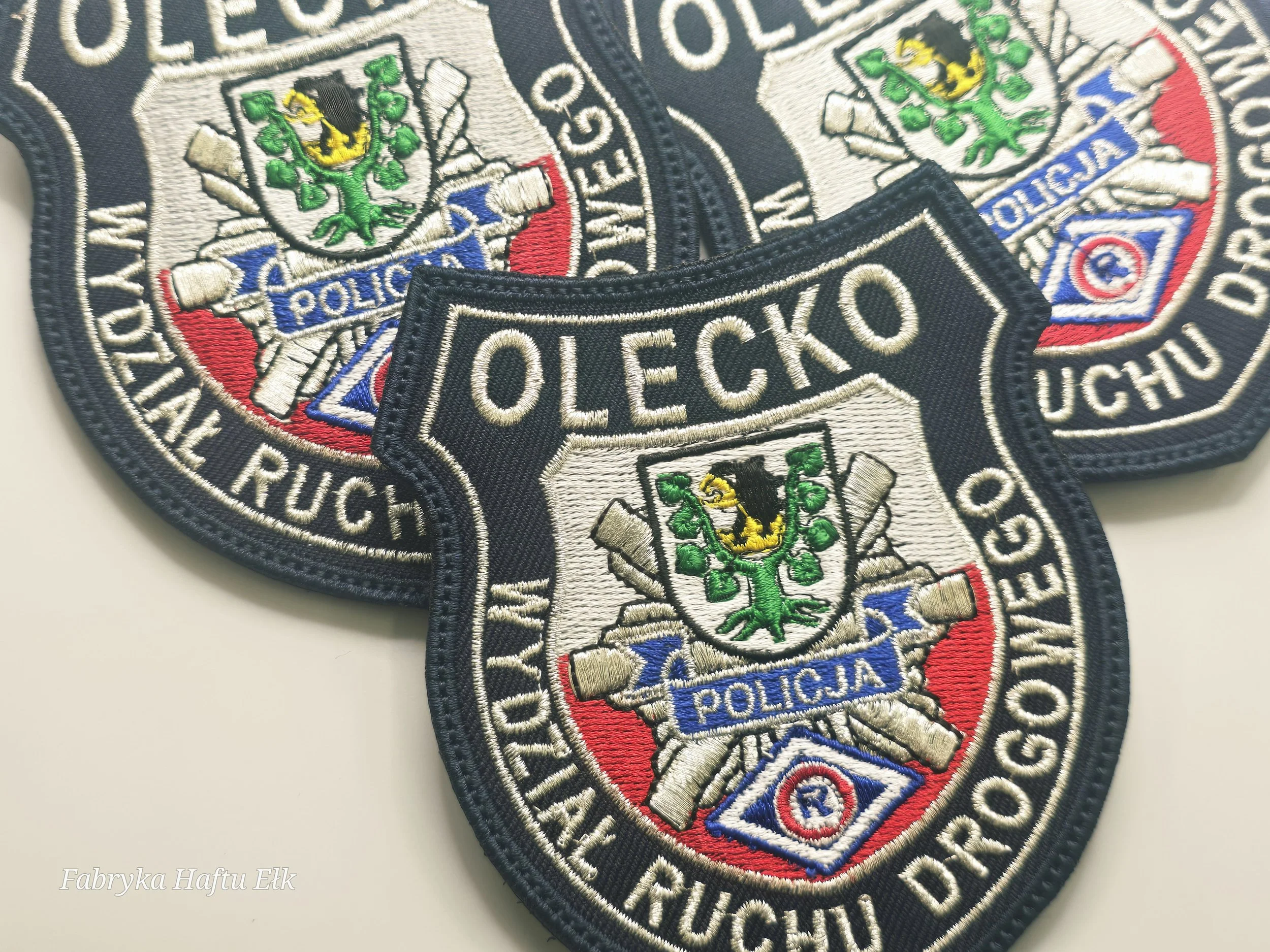 Haftowane naszywki Policji w Olecku – Wydział Ruchu Drogowego – Fabryka Haftu Ełk