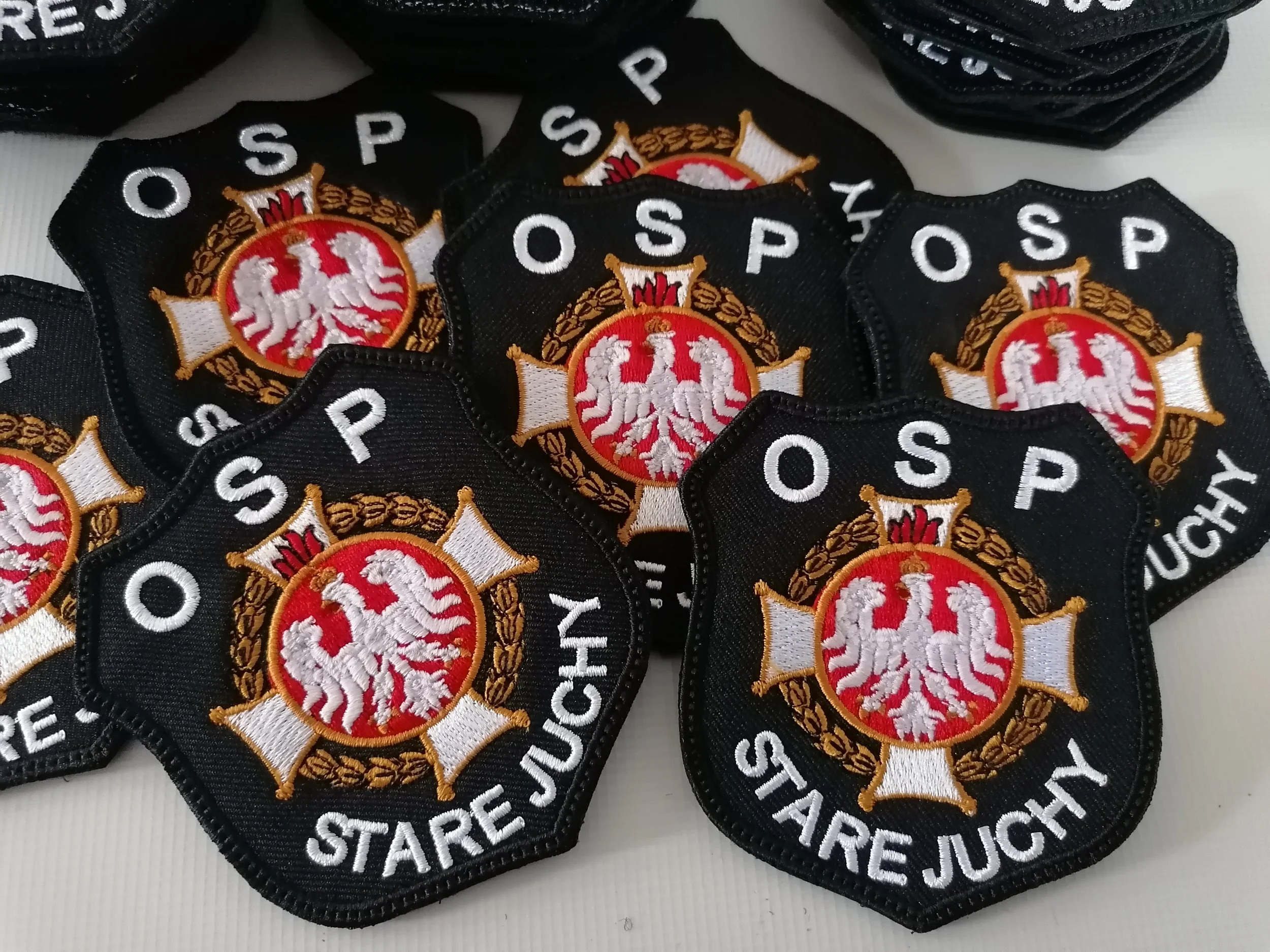 Haftowane naszywki strażackie OSP Stare Juchy na zamówienie – Fabryka Haftu Ełk