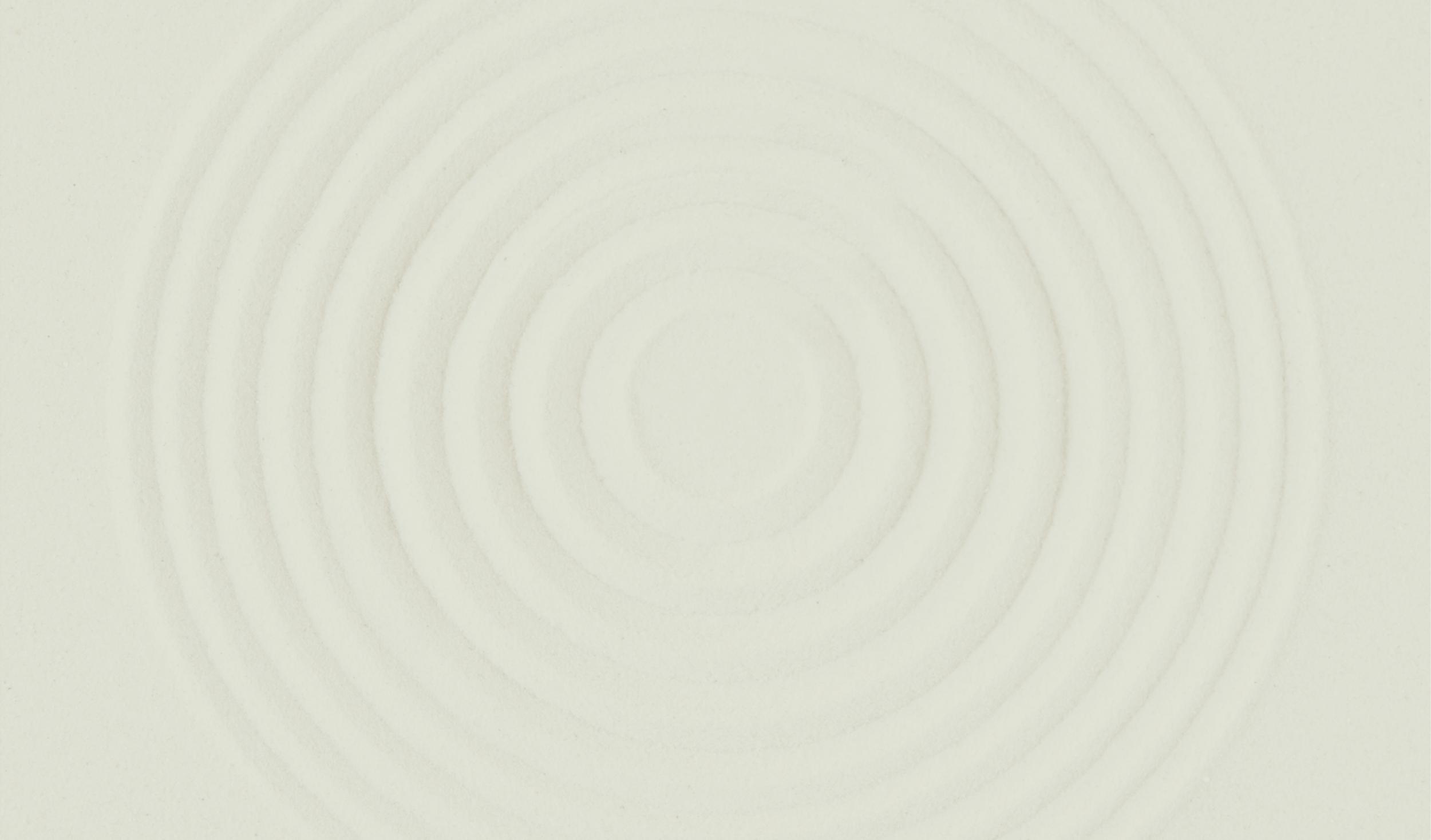 A computer-generated background with concentric circles fading from darker in the center to lighter at the edges.