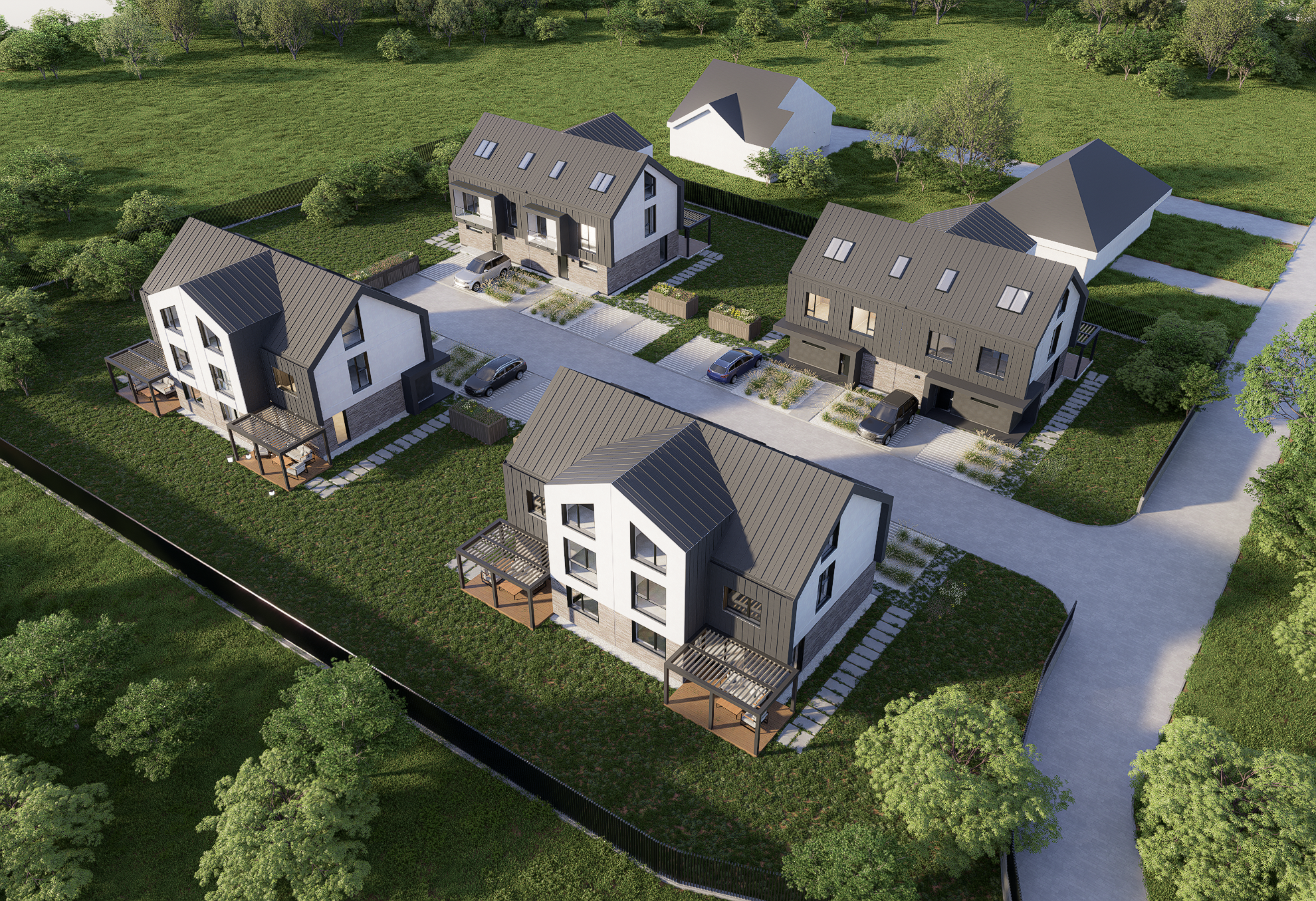 A residential housing complex consisting of six modern houses with gray roofs and white or gray walls, each with small landscaped gardens and driveways. The complex is enclosed by a fence, surrounded by green lawns and trees.