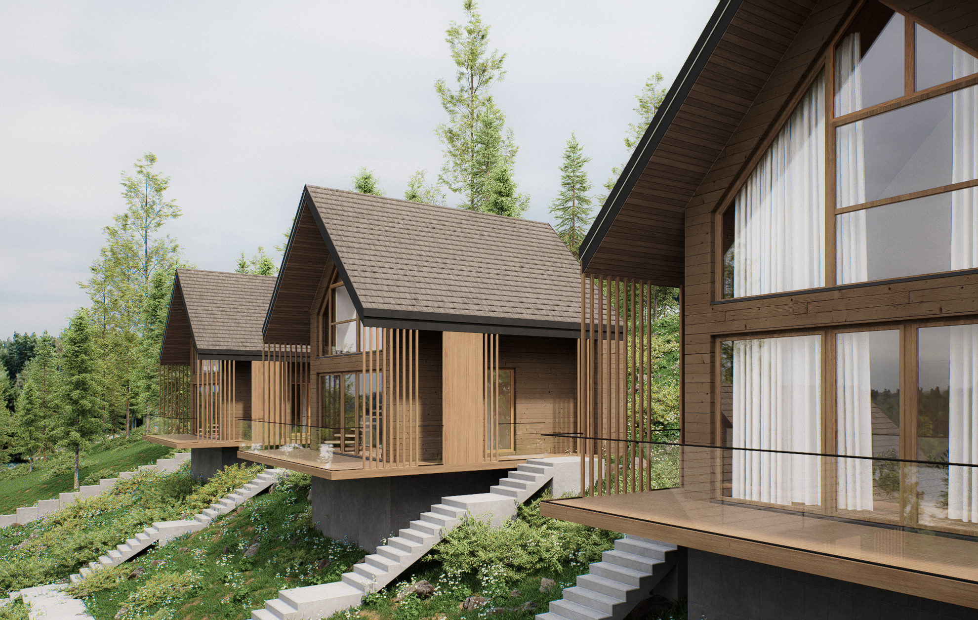 A modern housing complex with multiple wooden houses on stilts, featuring large windows and sloped roofs, surrounded by lush green trees.