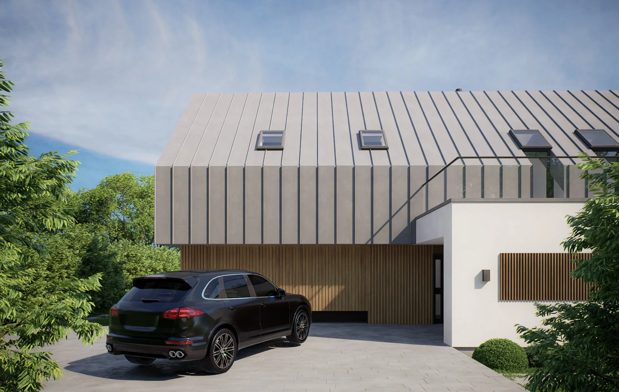 Modern house with a metallic sloped roof, three skylights, and a balcony with glass railing, with a black SUV parked in front, surrounded by green trees and bushes.