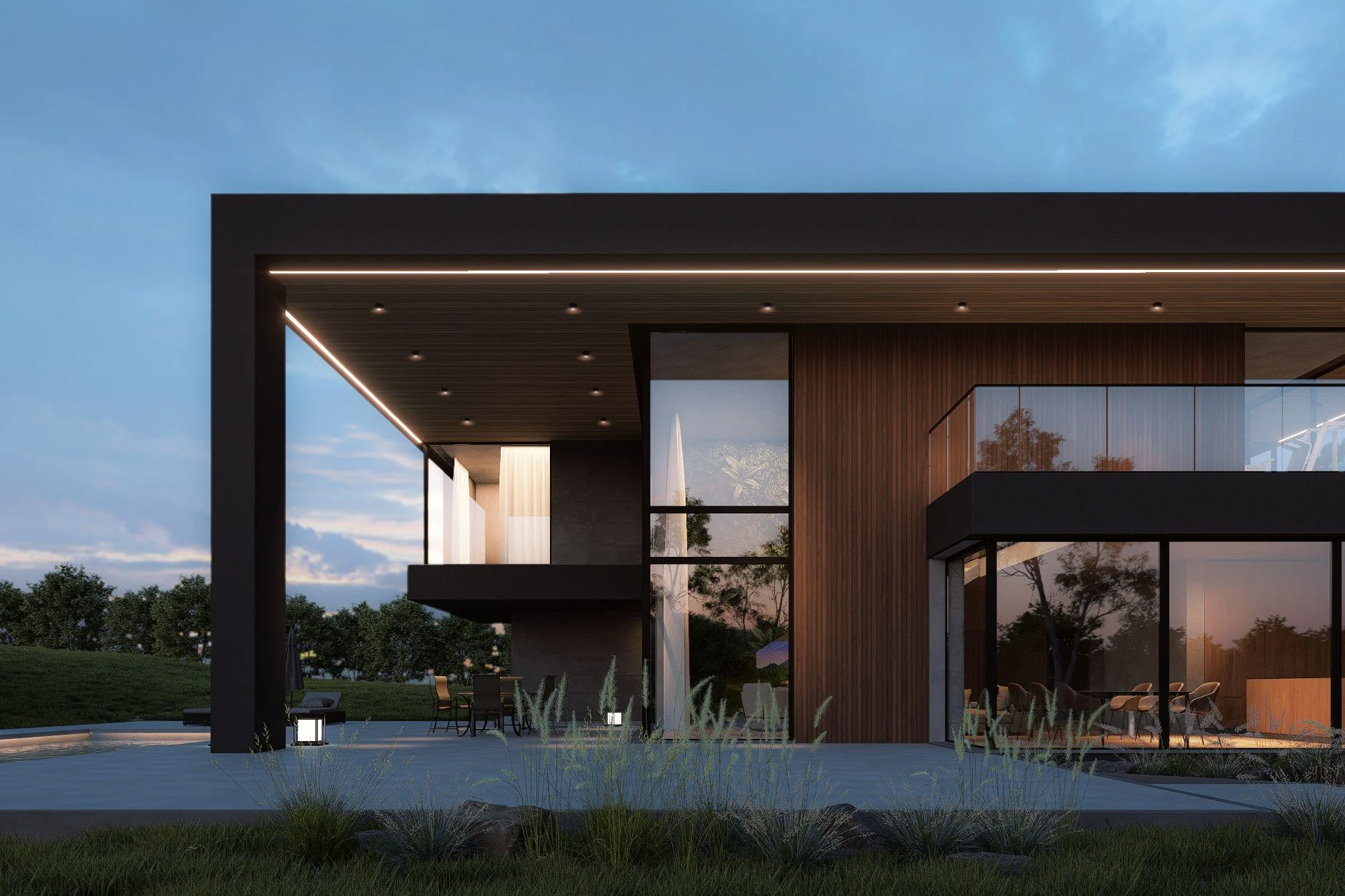 Modern house with large glass windows, outdoor patio with chairs and tables, and landscaped yard at dusk.