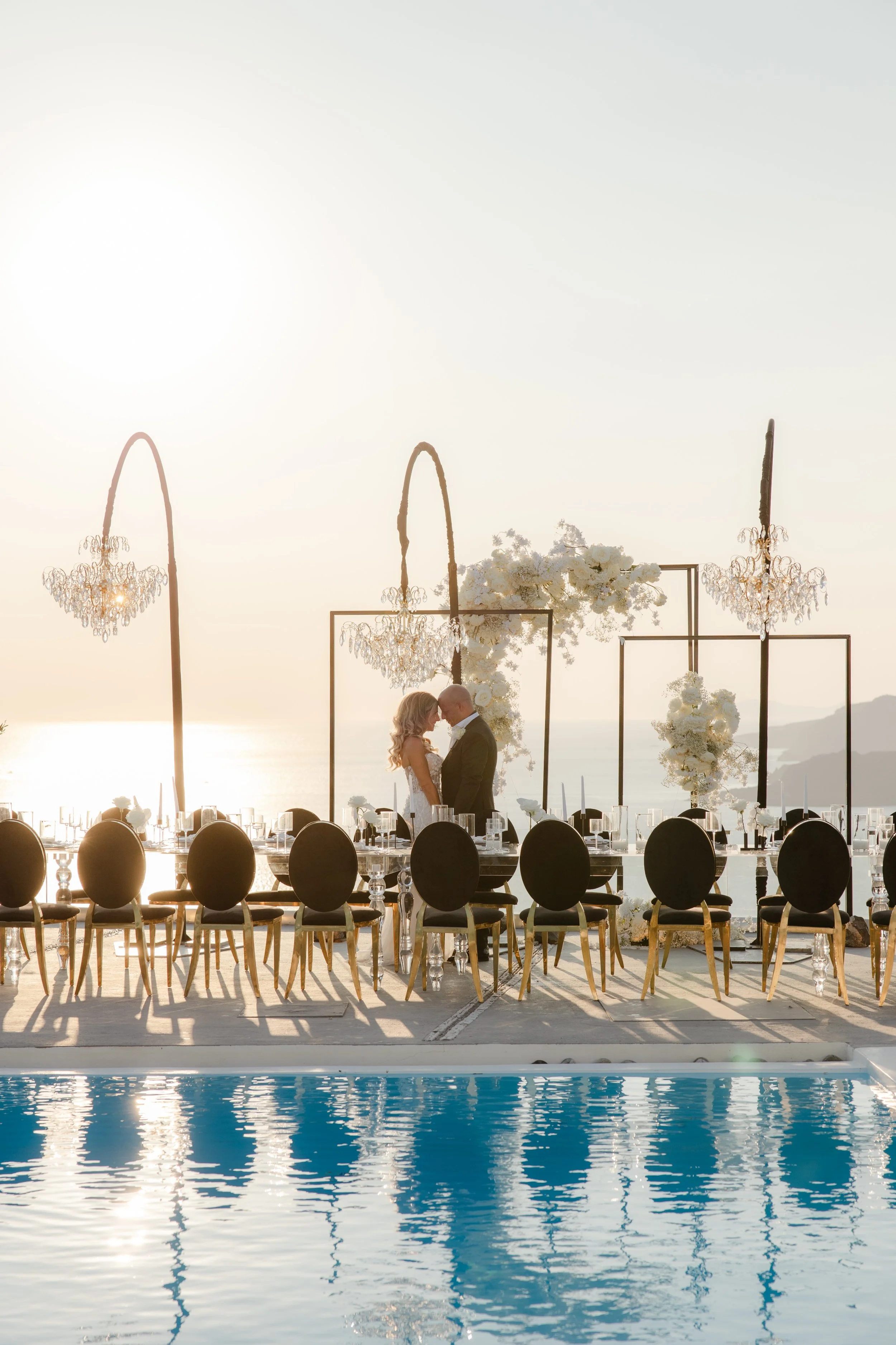 Luxury Wedding Reception in Santorini, Greece
An extraordinary long-table reception adorned with crystal chandeliers and refined floral design. A breathtaking display of luxury wedding styling in Greece’s most iconic island, Santorini.