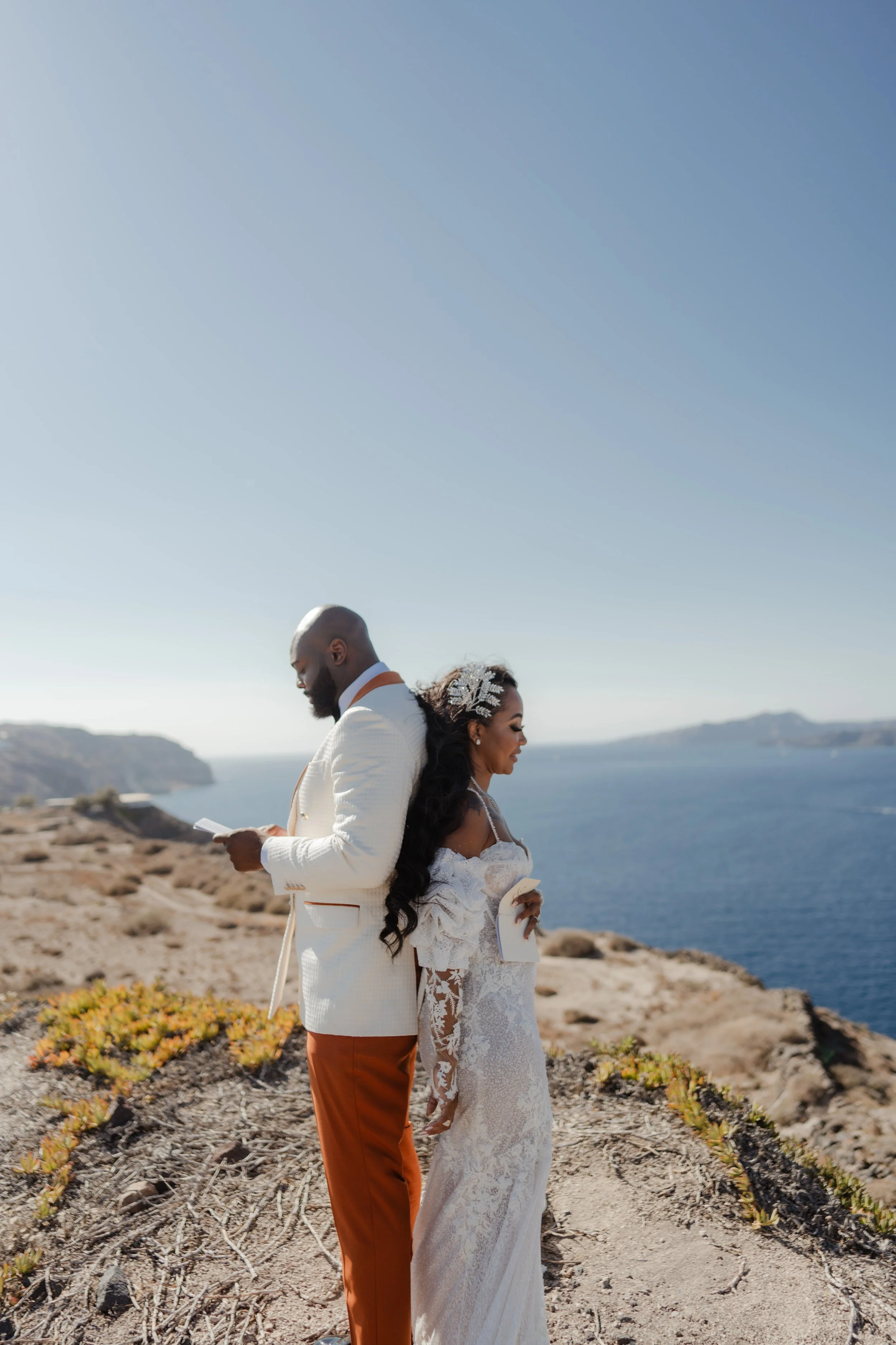 Luxury Wedding Couple in Santorini, Greece
The newlyweds embrace against the dramatic Santorini caldera. A romantic and elegant moment that captures the essence of a luxury destination wedding in Greece.