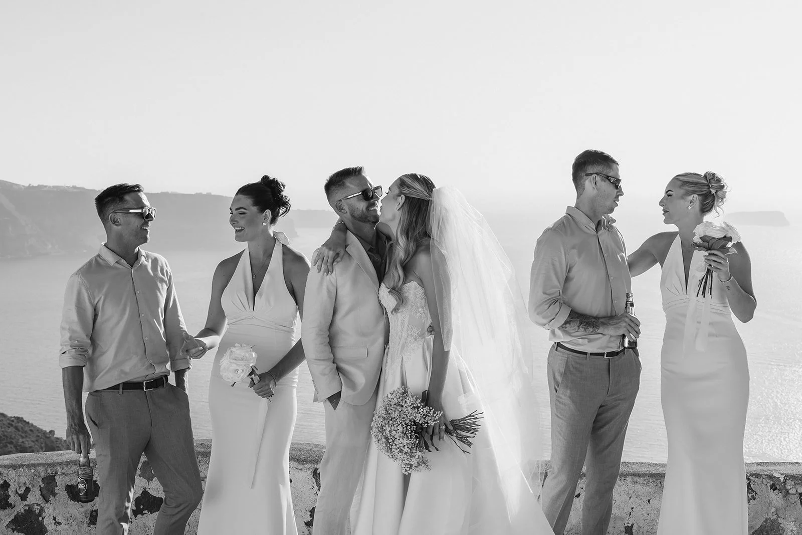 Stunning couple portrait from the wedding photoshoot, showcasing the bride’s gown and groom’s style with the Aegean Sea view.