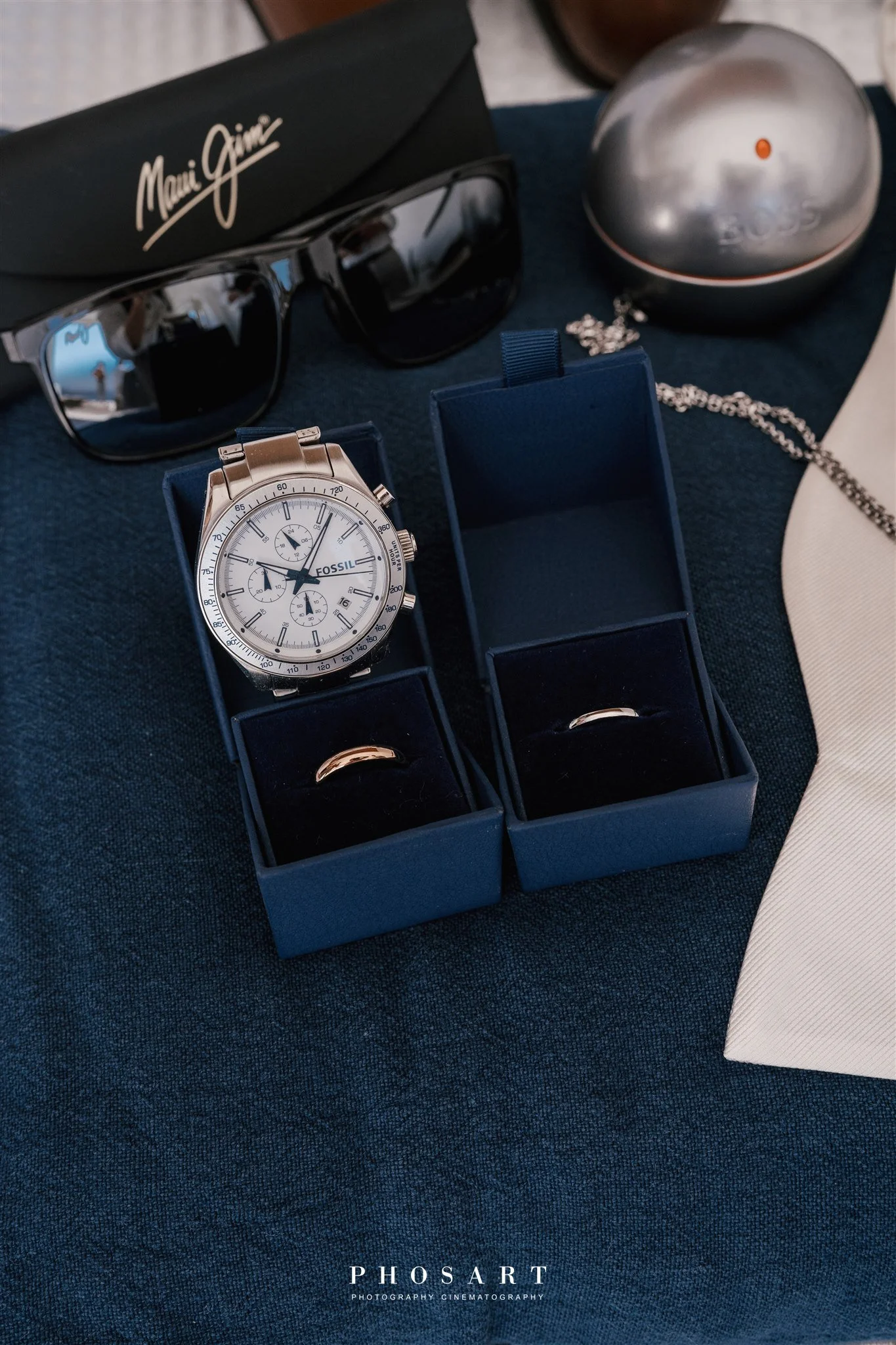 Refined groom details including watch and cufflinks, styled for a timeless and elegant wedding look.