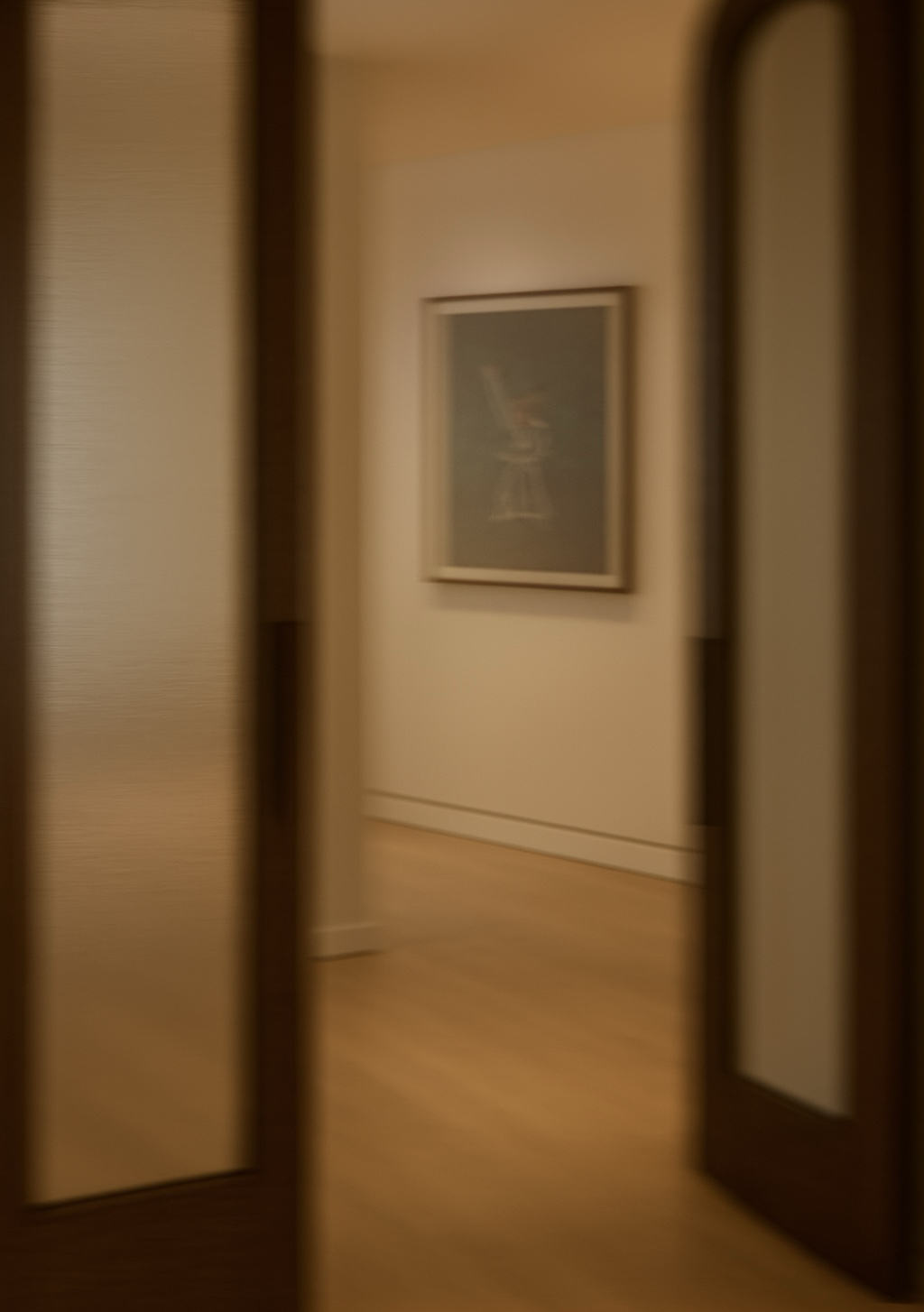 A softly blurred view of Happy Hour by Jack Penny through glass doors, a fleeting glimpse of contemporary art, captured in motion.