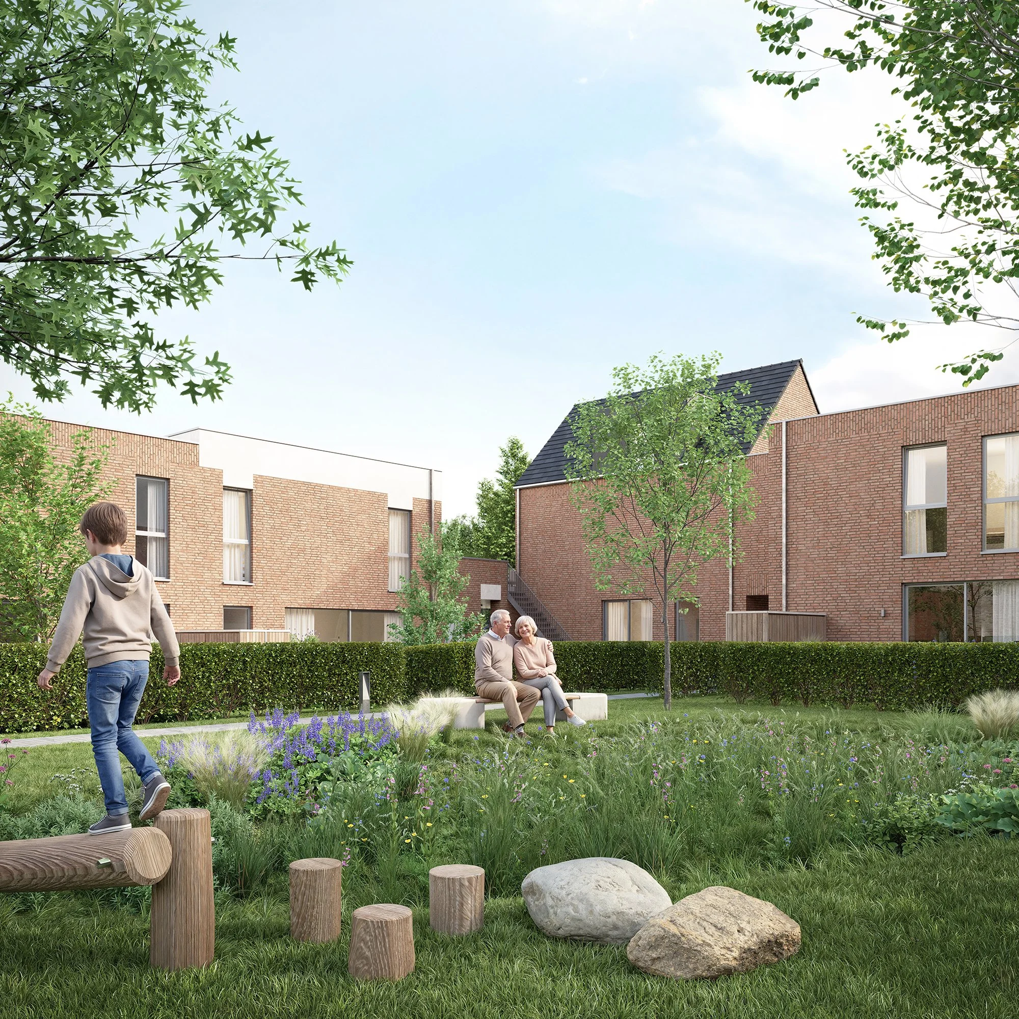 Mensen zitten op een bankje in een groene tuin met bloemen, terwijl een jongen wandelt. Er staan meerdere bomen en een rood bakstenen gebouw op de achtergrond, onder een heldere blauwe lucht.