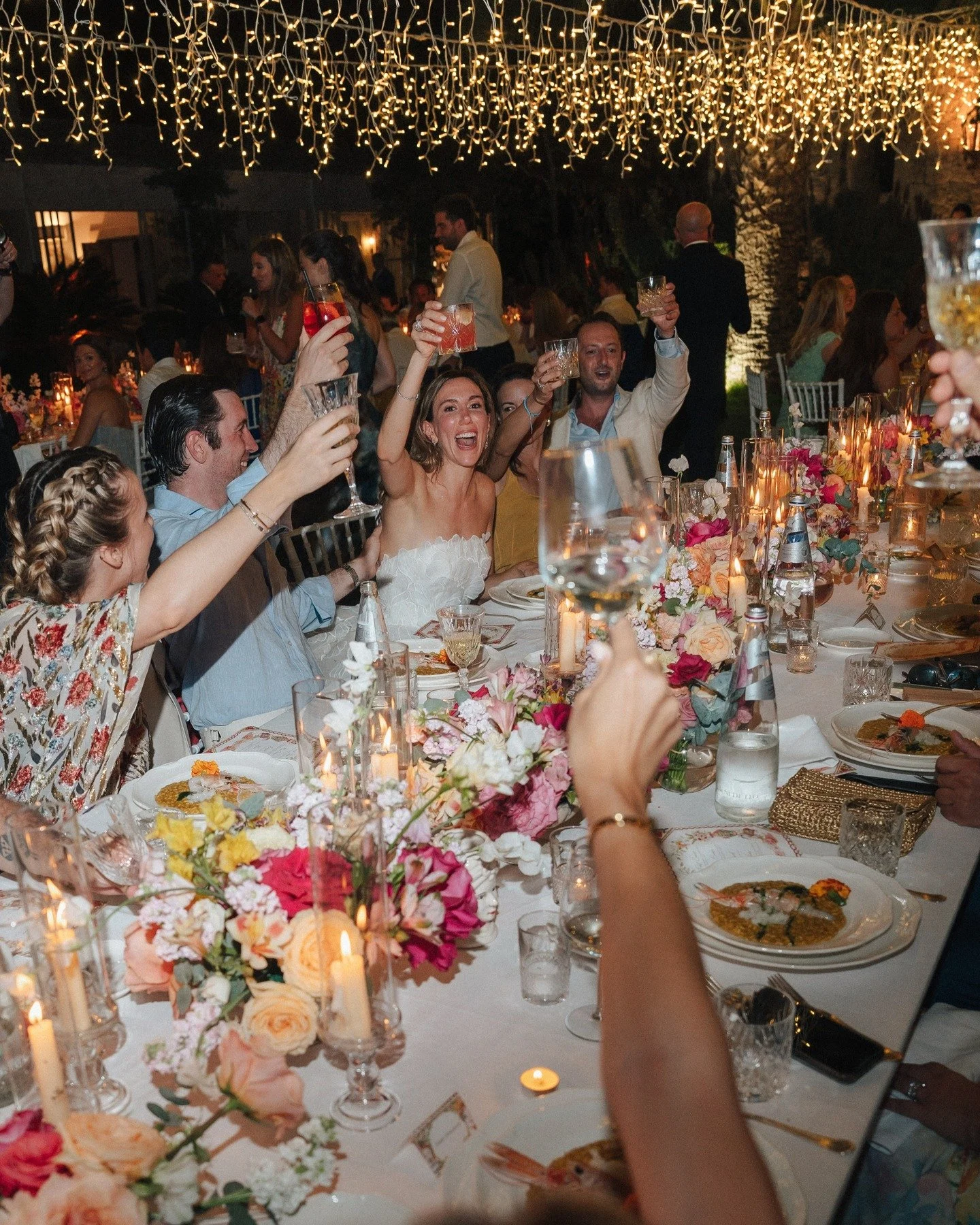 This is why I do what I do.

A long table under soft lights in Sicily. Glasses raised in the middle of laughter. No one thinking about how it looks, only about how it feels. These are the moments that matter to me. The ones that happen when a couple 