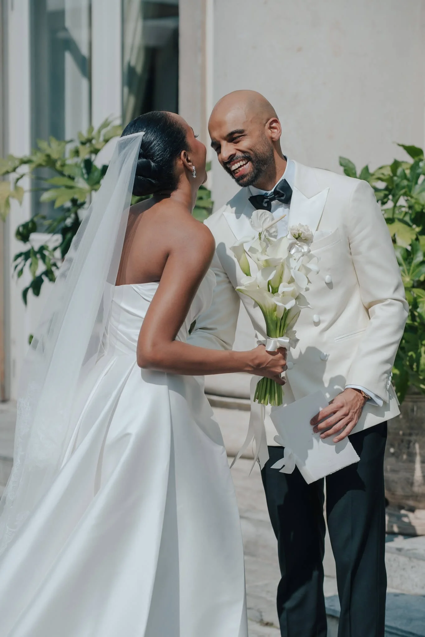 Couple smiling after first look at their Villa Geno destination wedding in Italy