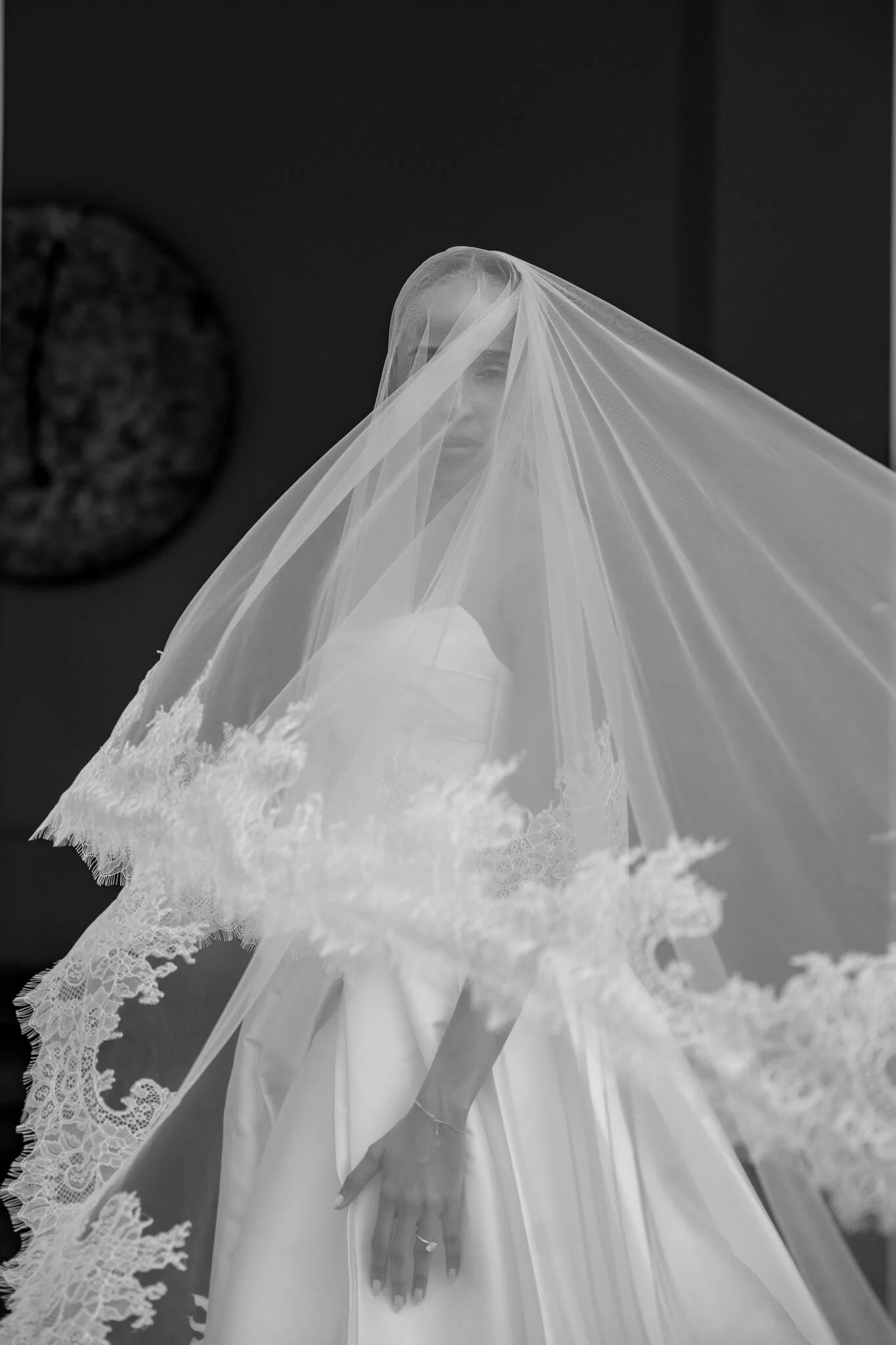 Bride under lace veil during elegant Lake Como wedding at Villa Geno