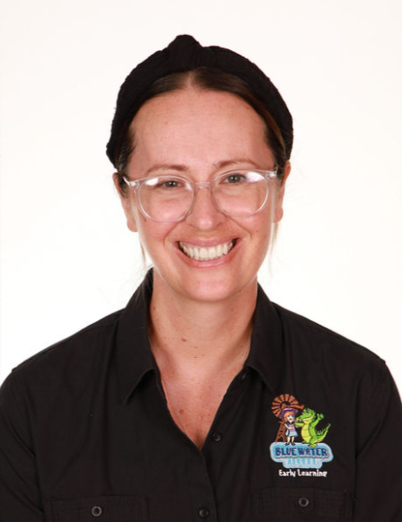 An early childhood educator with the nametag Jess