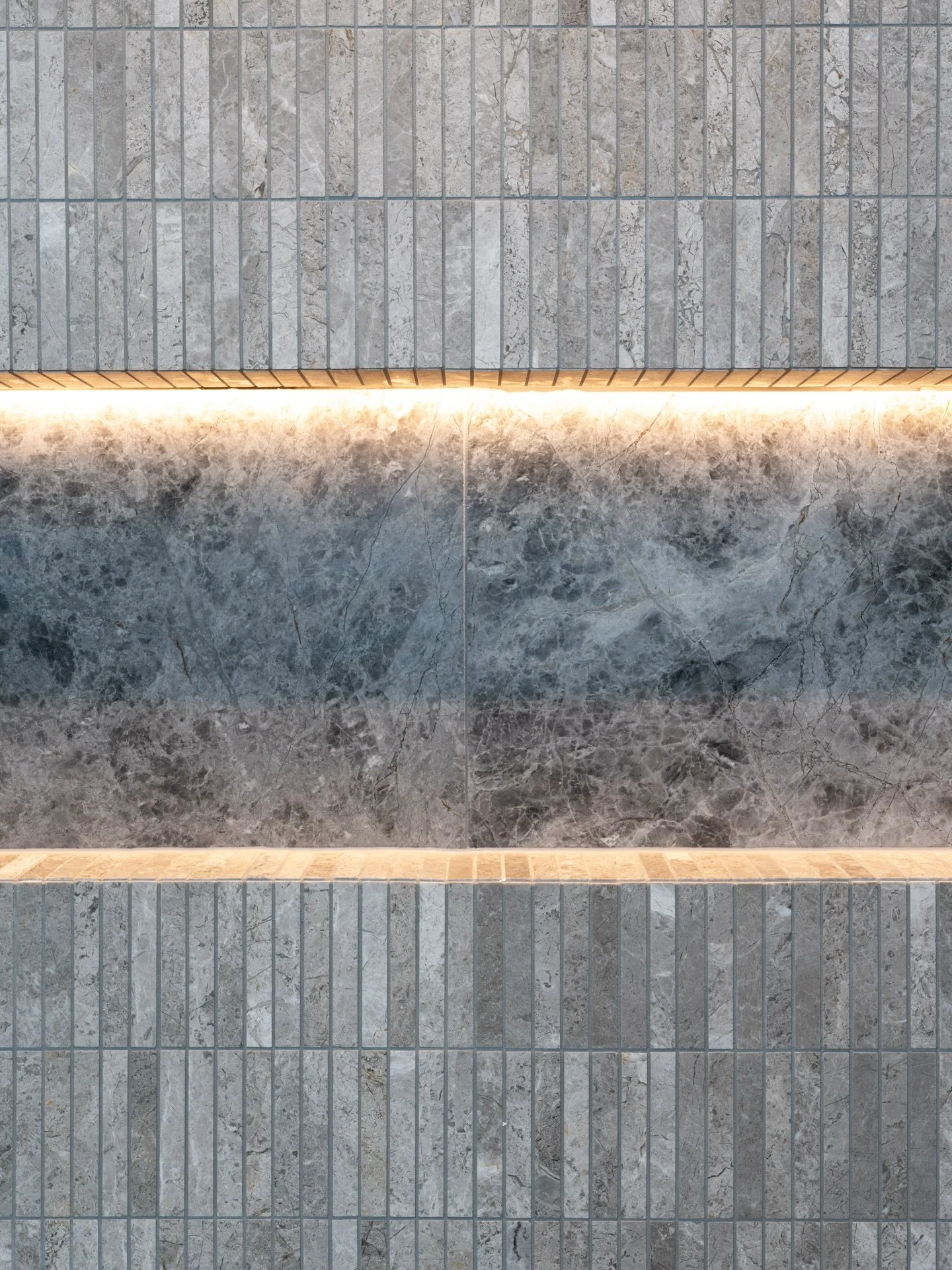 Light-filled. Thoughtfully tiled. A bathroom that balances elegance and ease. 

@mm_architects_aus 
@tca_electrical