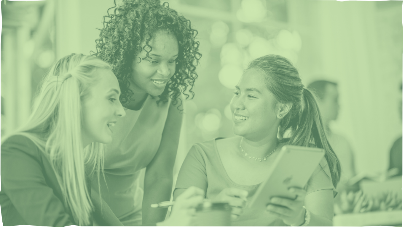 A group of women collaborating with an iPad