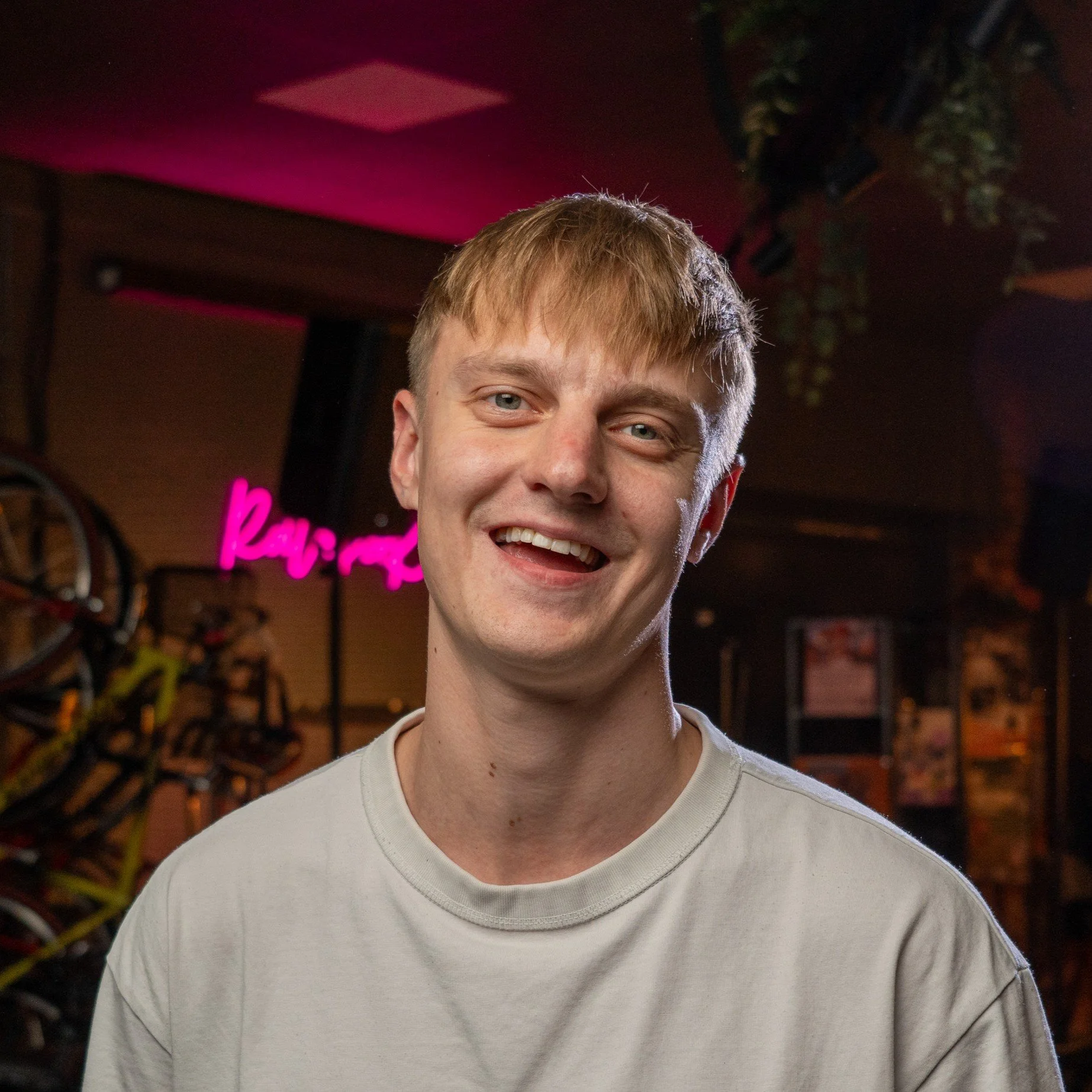 Comedian posing and smiling