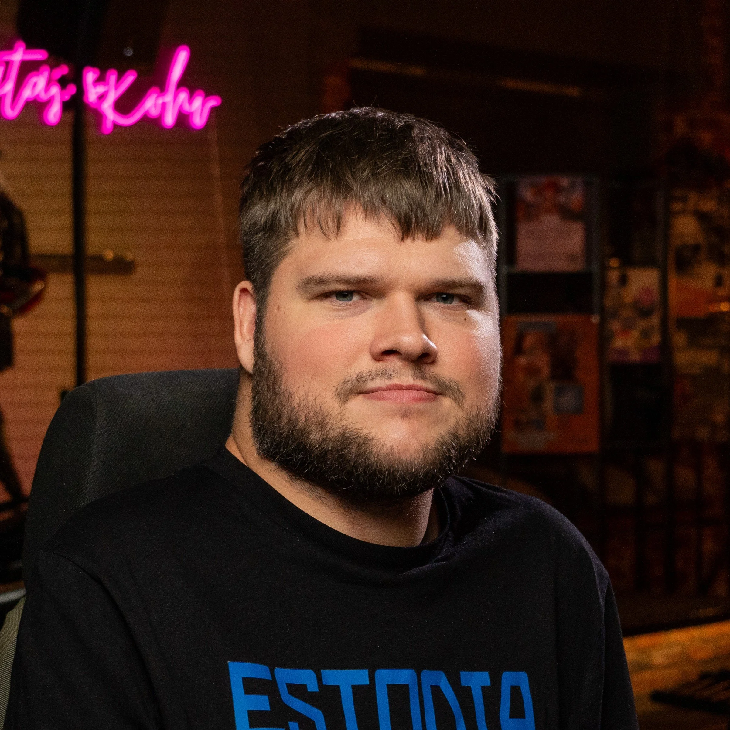 Comedian in a wheelchair posing and smiling