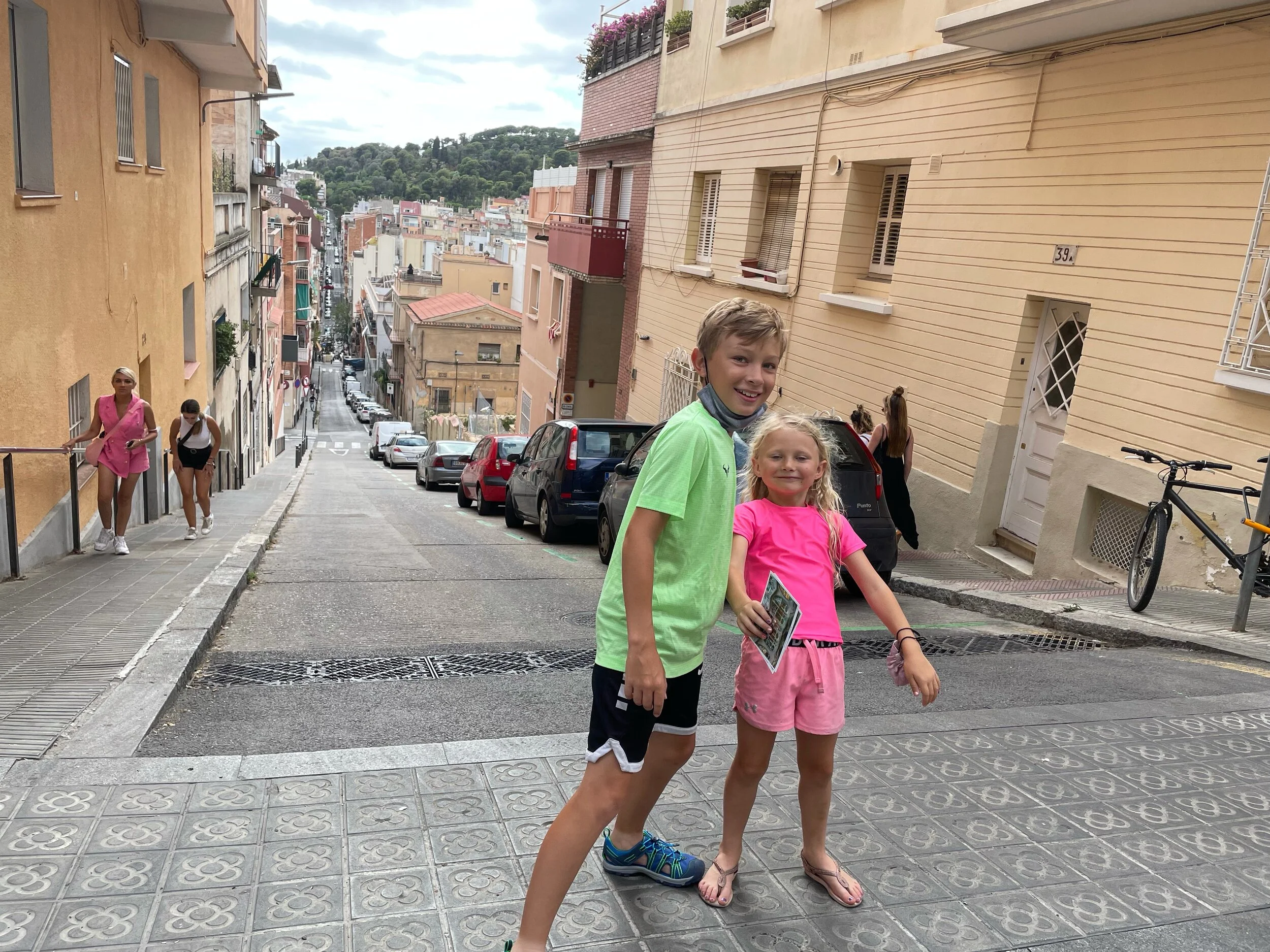 Lean on me! Steeper than the photo looks, we were surprised and delighted by the precipitous mount to Park Güell.
