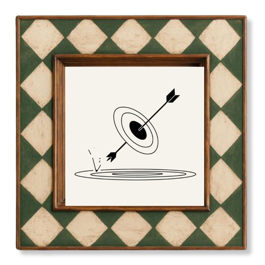 A framed illustration of a target with an arrow hitting the bullseye, and a small splash in water below it.