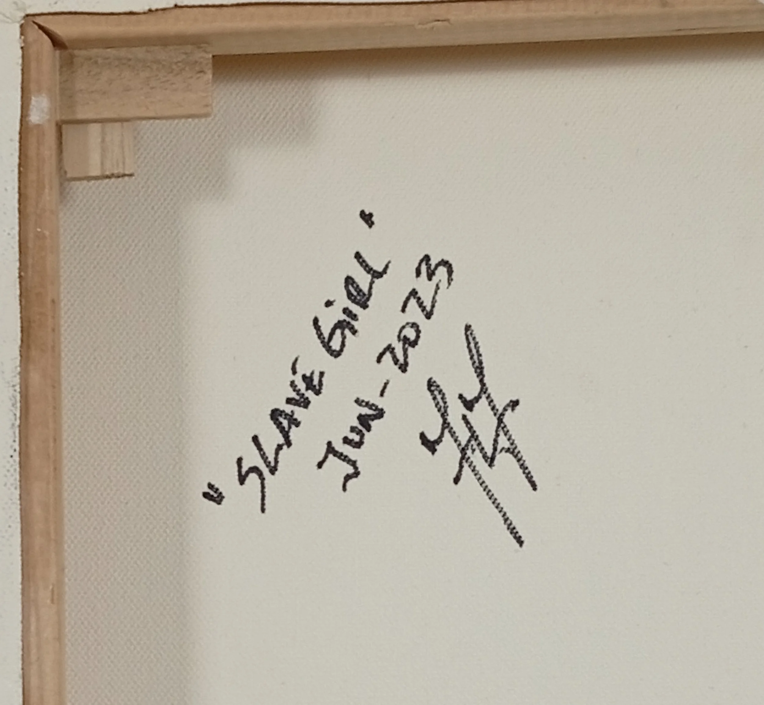 Back of the canvas "Slave Girl" with title, June 2023 date, and artist HMad's signature.