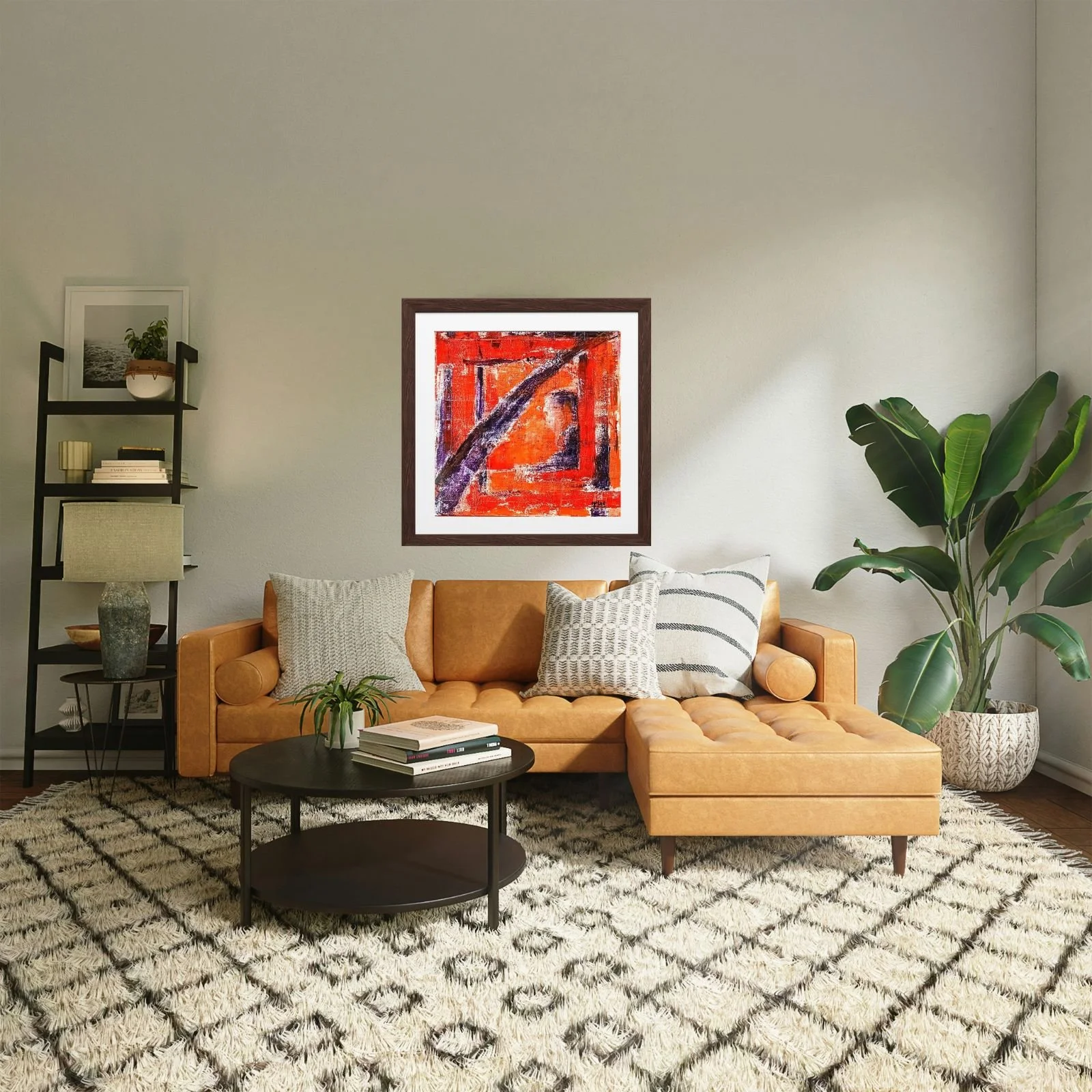 “Passenger” acrylic painting on canvas, red, orange, purple and white tones, framed and displayed in a modern living room with camel sofa, beige rug and decorative plant, HMad Artworks.