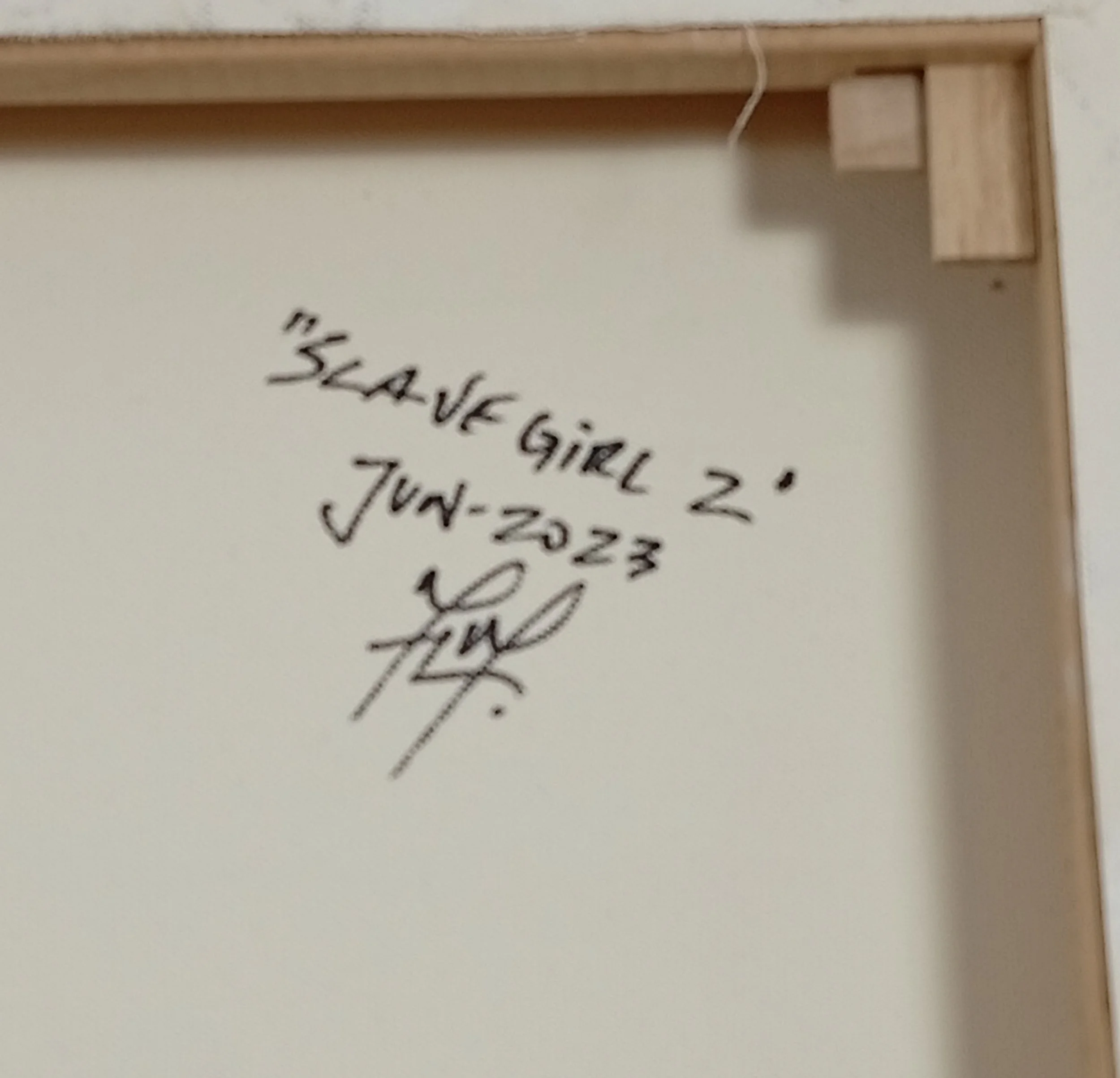 Back of the painting “Slave Girl II” with artist’s signature and date, June 2023, HMad Artworks.