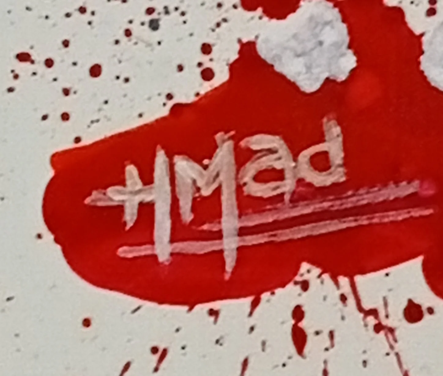Detail of the “HMad” signature on the painting “Slave Girl II”, acrylic on canvas, June 2023.