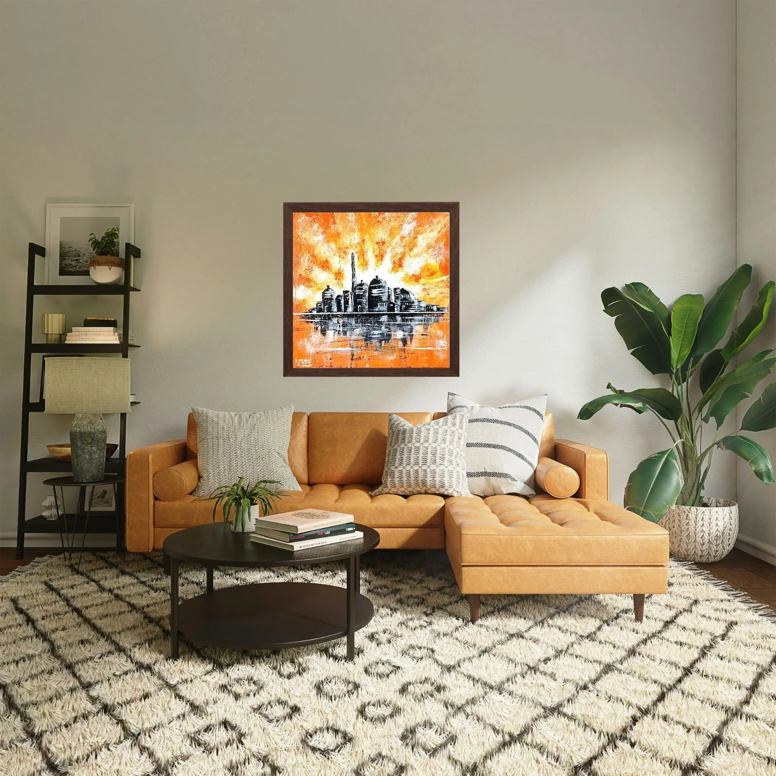 Pintura “Somewhere By A River” em acrílico sobre tela, tons laranja, amarelo, preto e branco, emoldurada e exposta numa sala moderna com sofá camel, tapete bege e planta decorativa, HMad Artworks.