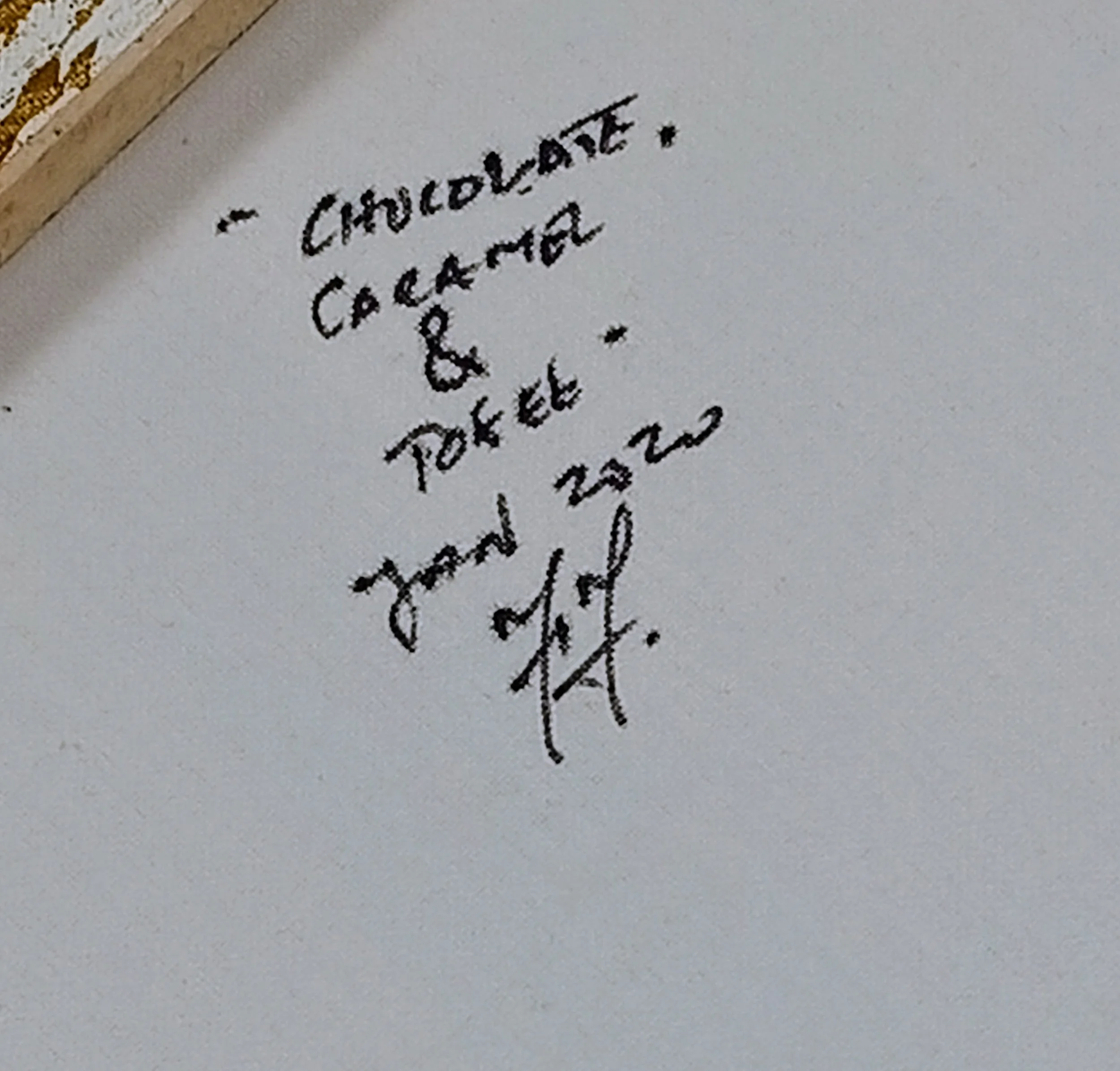 Verso da pintura “Chocolate, Caramel & Toffee” em acrílico sobre tela, inscrição com título, data e assinatura, 50×50×1 cm, março de 2022, HMad Artworks.