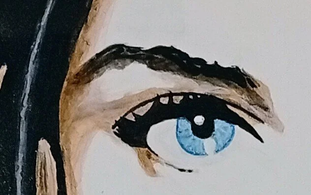 Close-up of the blue eye and dark eyebrow in HMad’s “Rute” painting.