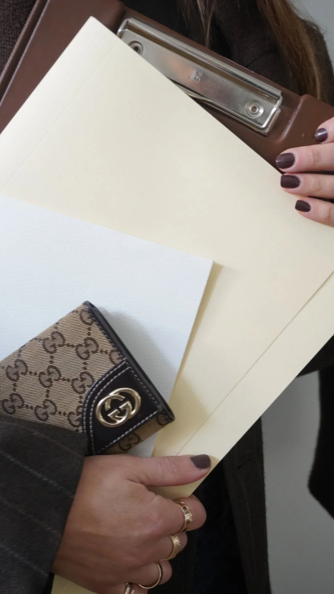 Person using a white stylus on a tablet with a reflective screen. creates, designs wellness strategies, protocols and routines for lasting results