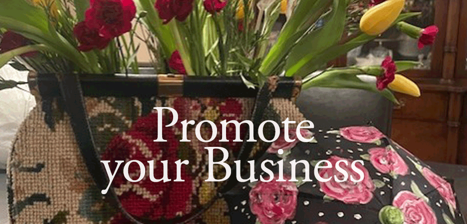 A floral display in a basket with the overlay text 'Promote your Business'
