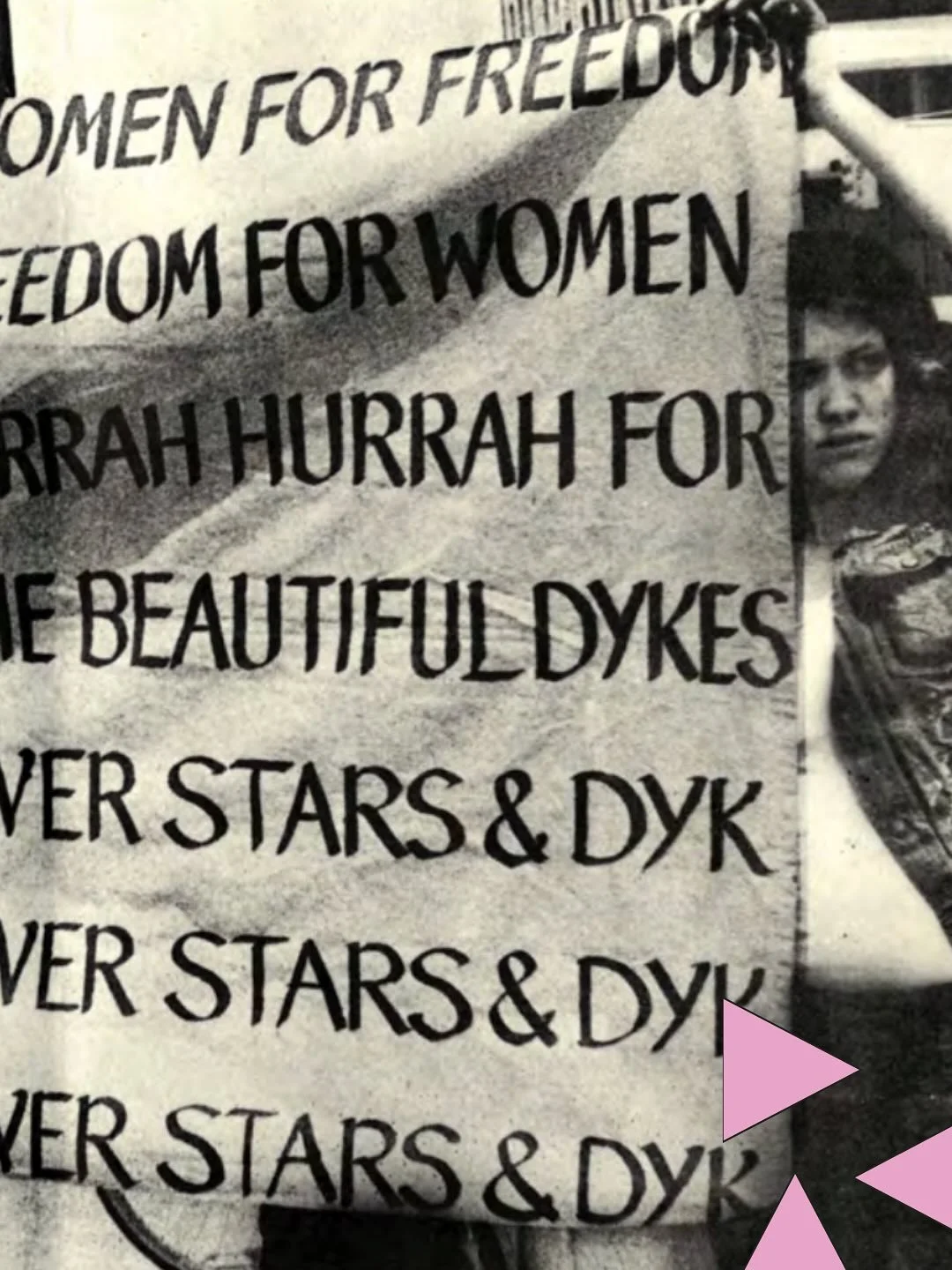 Photo from the cover of the July &rsquo;73 issue of Focus: A Journal for Gay Women. Depicts a group of women flying a modified United States flag at the Gay Pride March in New York City on June 24, 1973, in the Lesbian Feminist contingent. The stars 