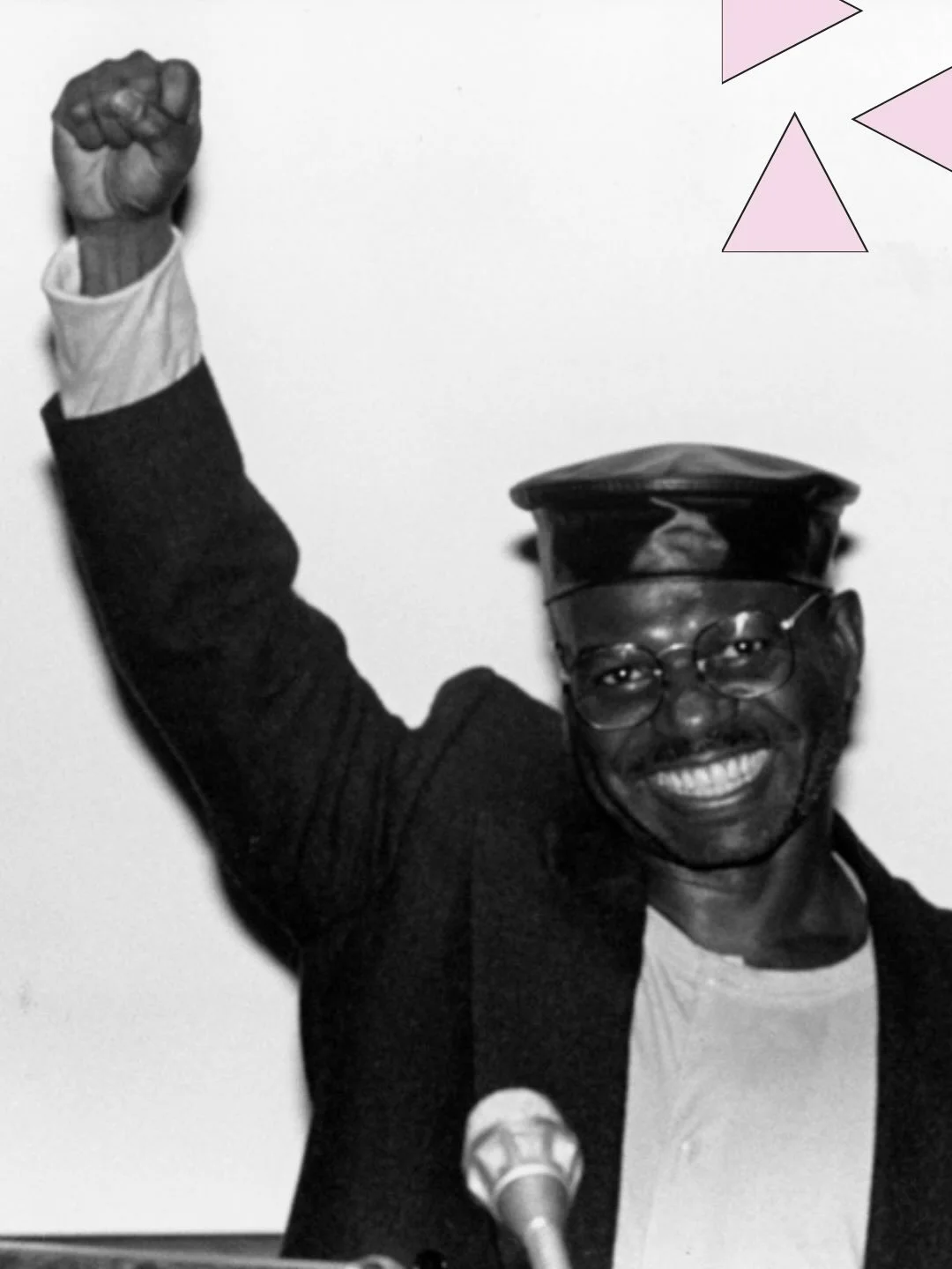 Filmmaker Marlon Riggs (1957 &ndash; 1994) holds up his fist at a 1990 Lesbian and Gay Studies Conference at Harvard University. Riggs&rsquo; film Tongues Untied (1989) received nationwide backlash for depicting a kiss between gay men. Riggs responde
