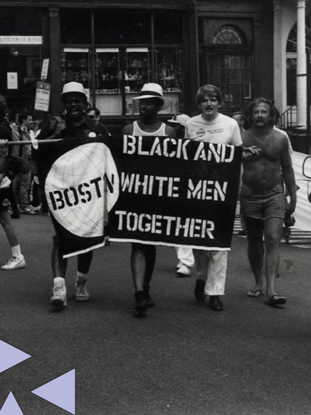 Black and White Men Together banner group marching onto Beacon St. in front of the MA State House.

📸 Wechsler

Coll. 104 Gay Community News Photograph Collection

Were you there? Have a story to share? Drop a comment below or email us at info@queer