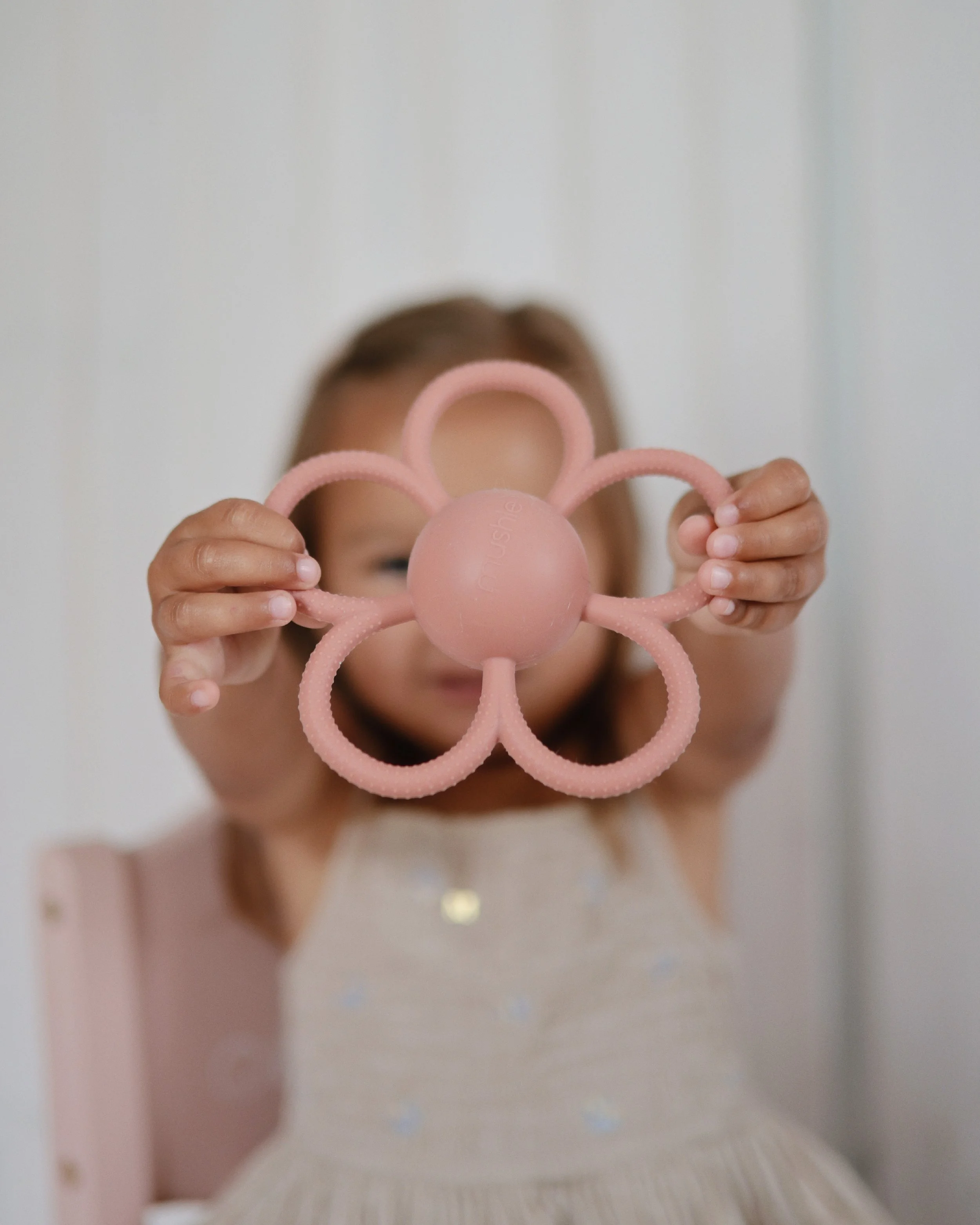 Teethers_Daisy Rattle - Dusty Rose - 003.jpg