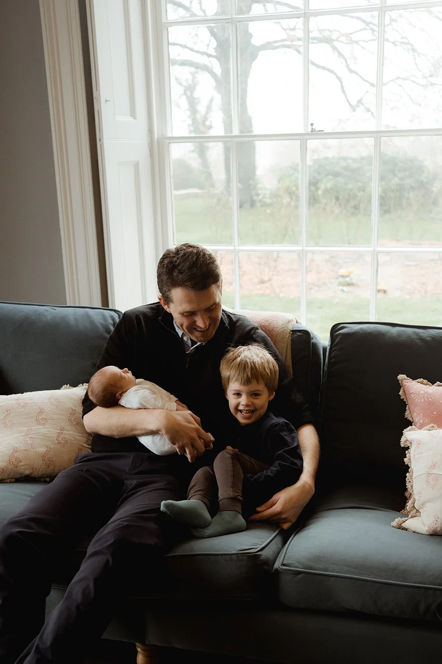 Newborn and family photographer Bath - Portrait of father, son and baby.
