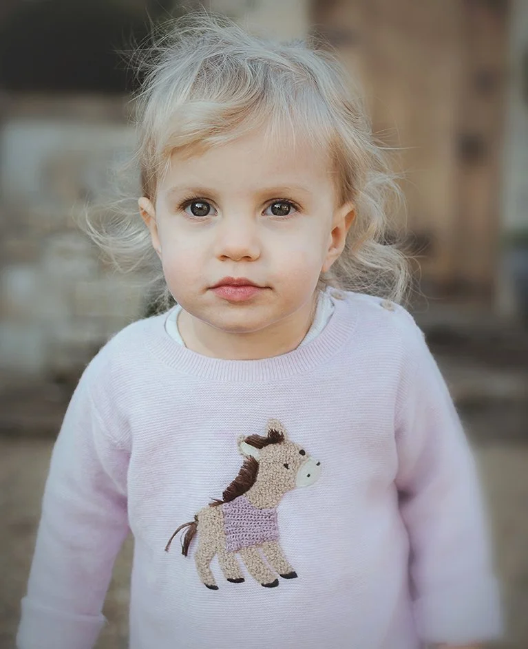 Image of older daughter during a family photoshoot.
