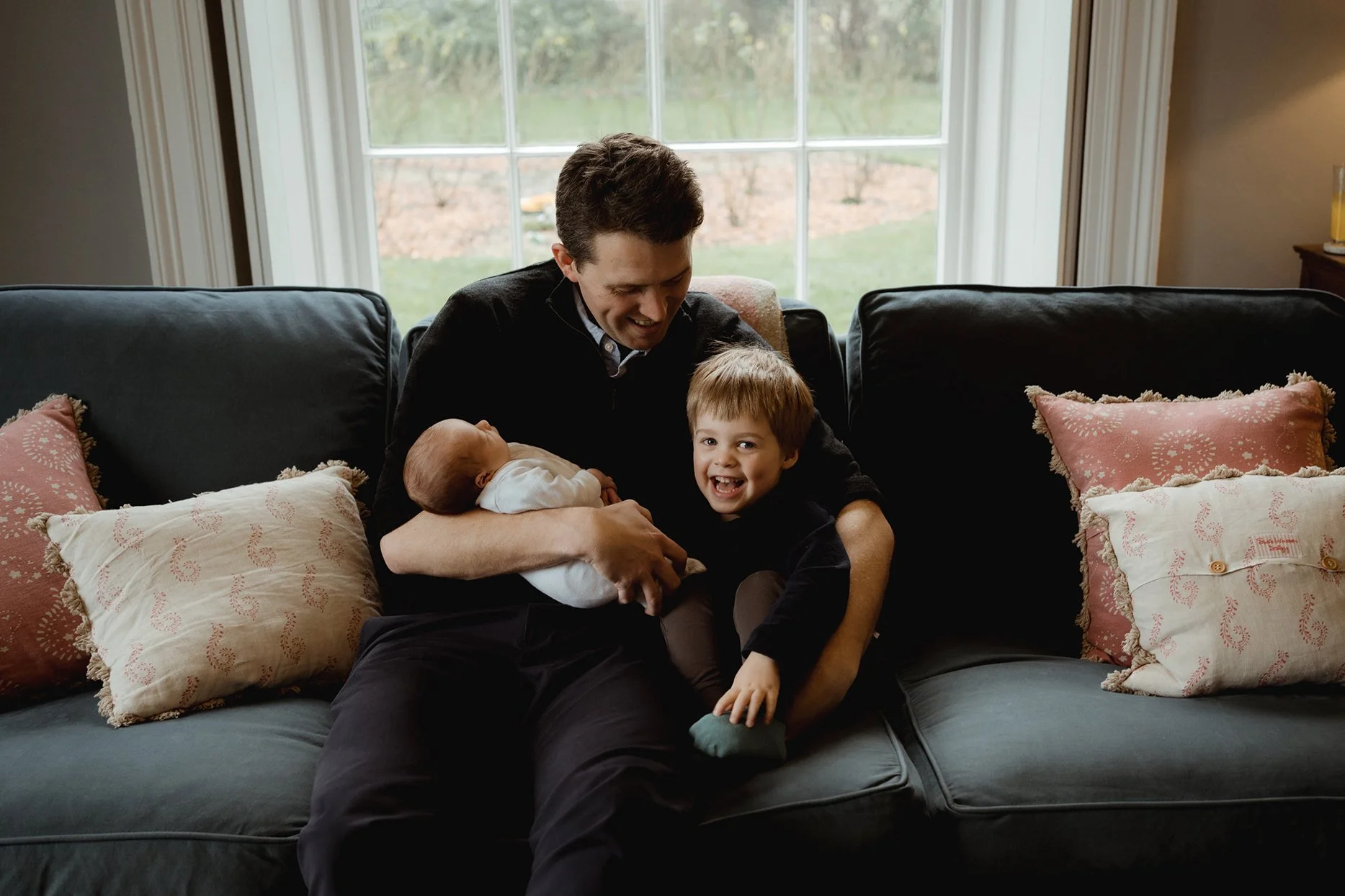 Newborn and family photographer Bath - Portrait of father, son and baby.