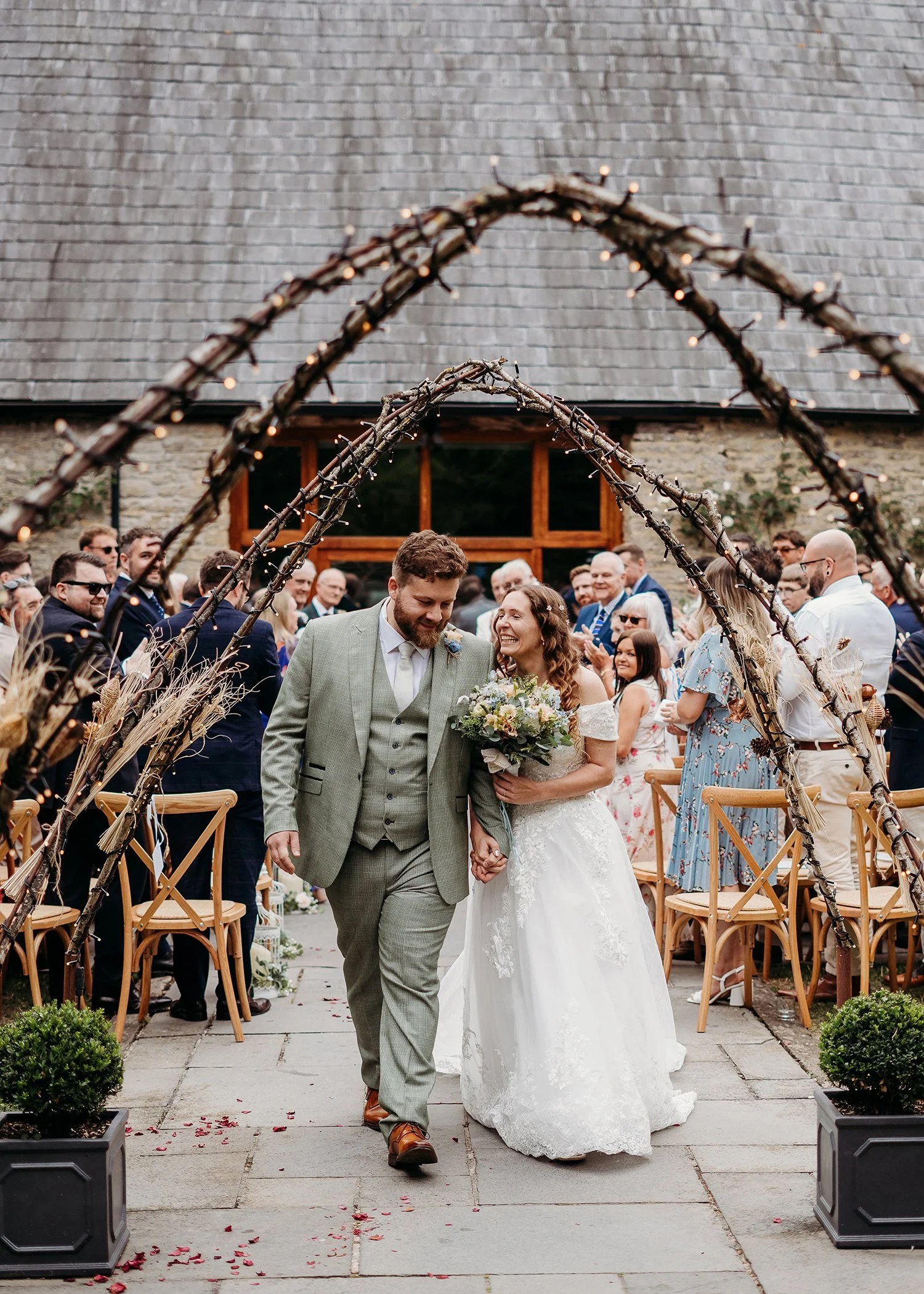 Bristol & Bath wedding photographer - image of wedding couple leaving ceremony.