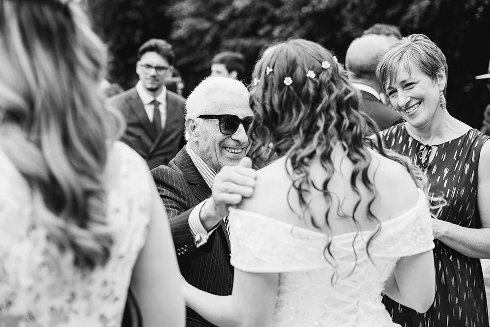 Bristol & Bath wedding photographer - image of a guest congratulating the bride.