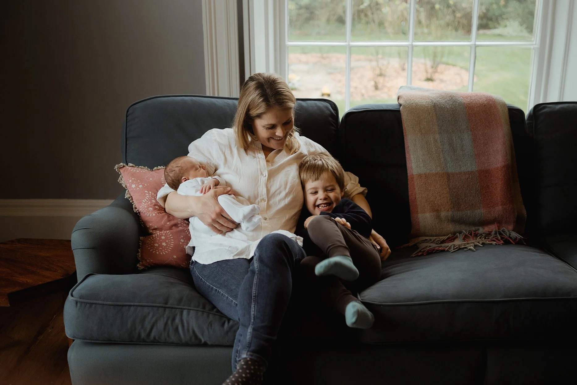 Mother and her son with a newborn baby during a photoshoot in Bath.
