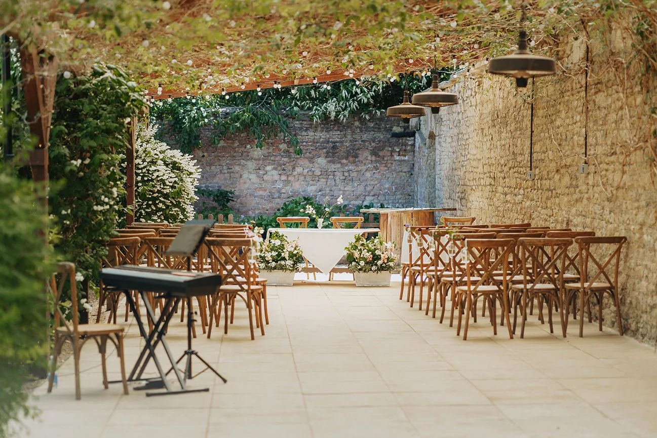 Wedding photographer Bristol - image of everything prepared for the wedding ceremony outside at Old Down.